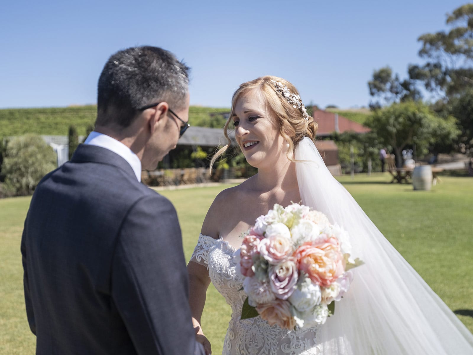 coriole wines wedding - marielle & brendan 25 Smiling bride during first look
