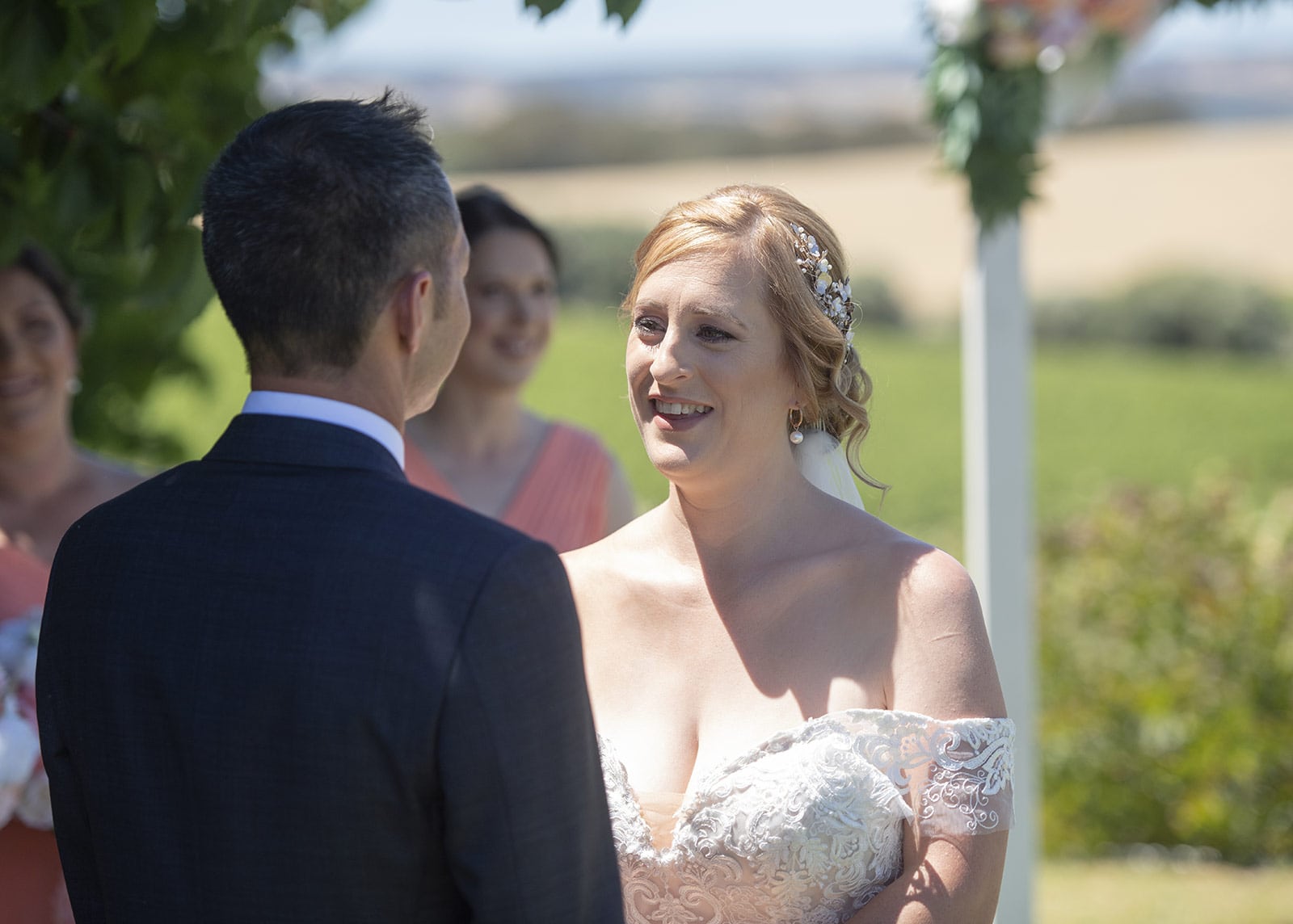 coriole wines wedding - marielle & brendan 38 Smiling bride during the ceremony