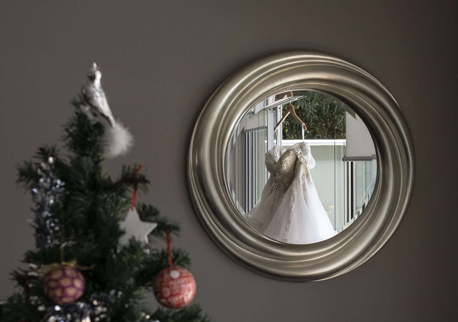 lake breeze wines wedding - cate & renato 12 Wedding dress in mirror