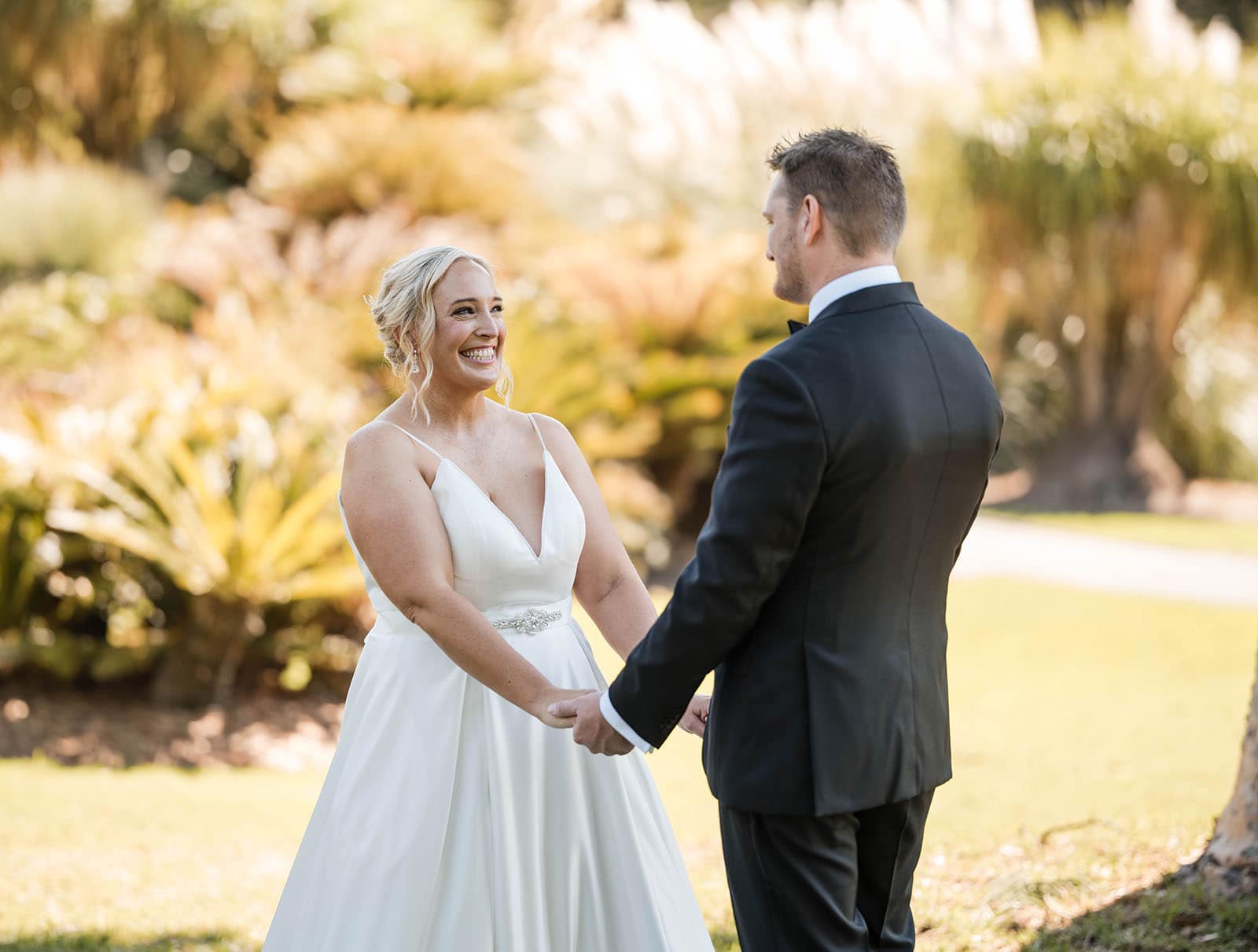 adelaide botanic gardens cycad collection wedding - joanne & blake 17 Bride grinning looking at her groom