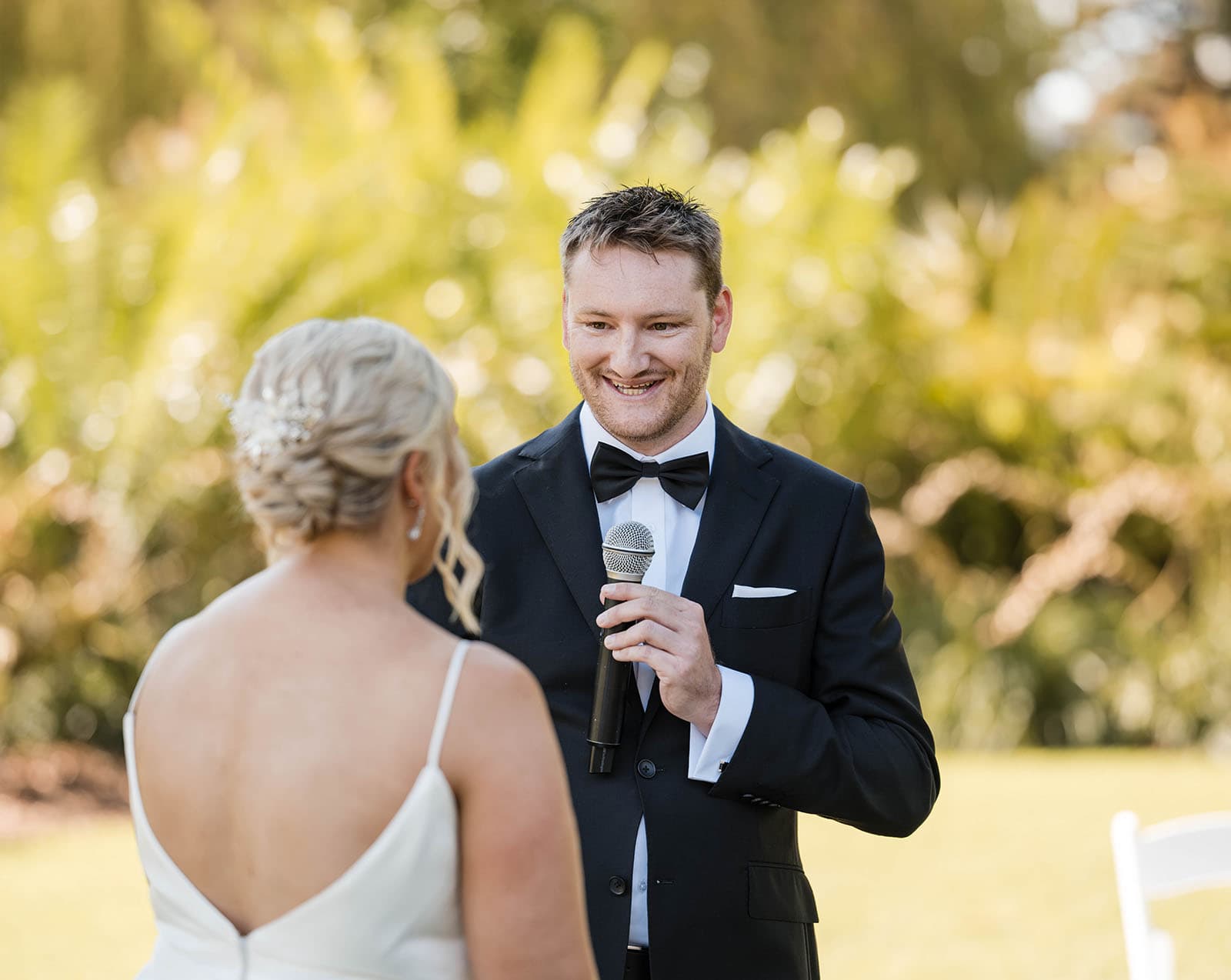 adelaide botanic gardens cycad collection wedding - joanne & blake 18 Groom grinning as talking into microphone