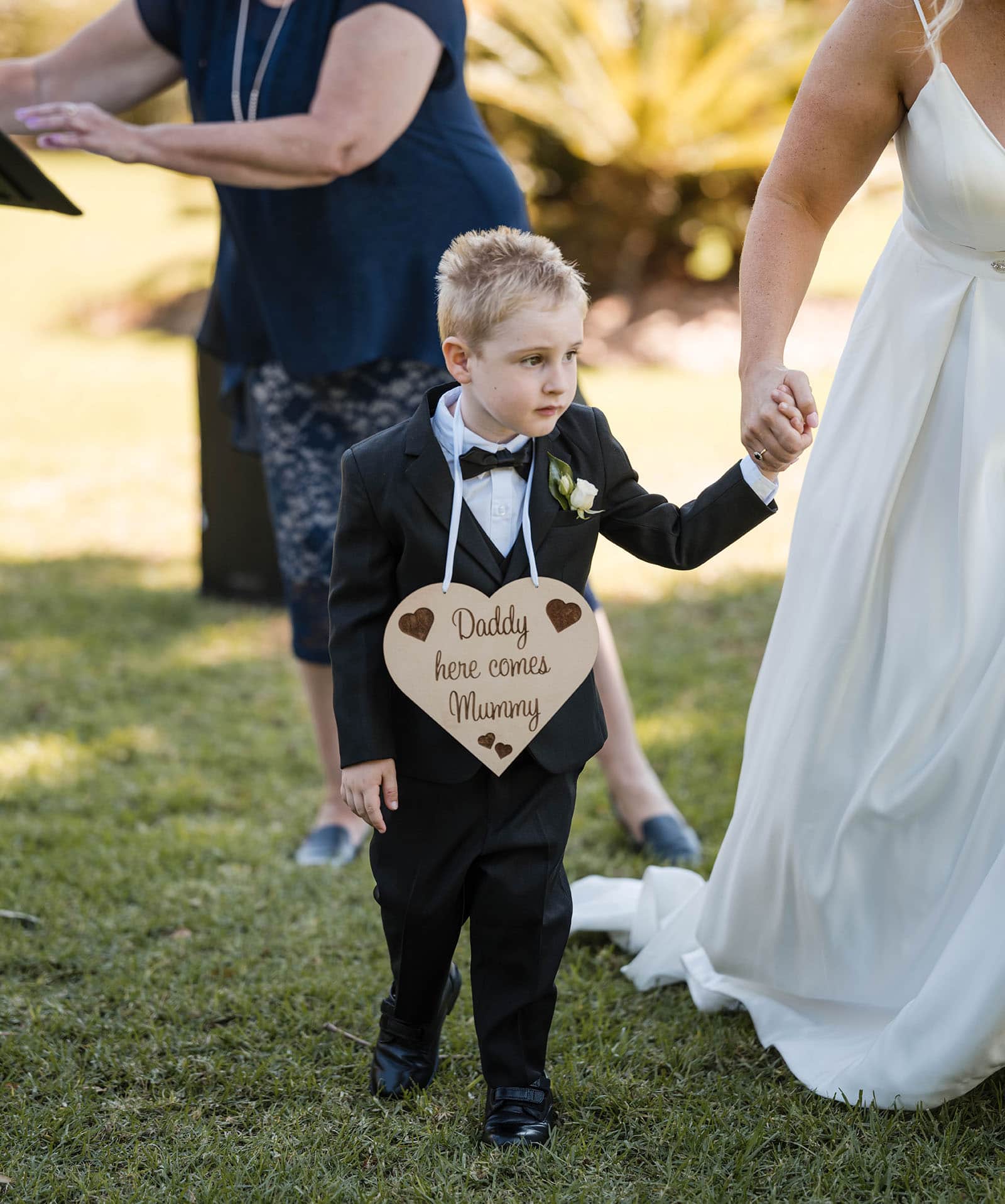 adelaide botanic gardens cycad collection wedding - joanne & blake 11 Page boy wearing heart