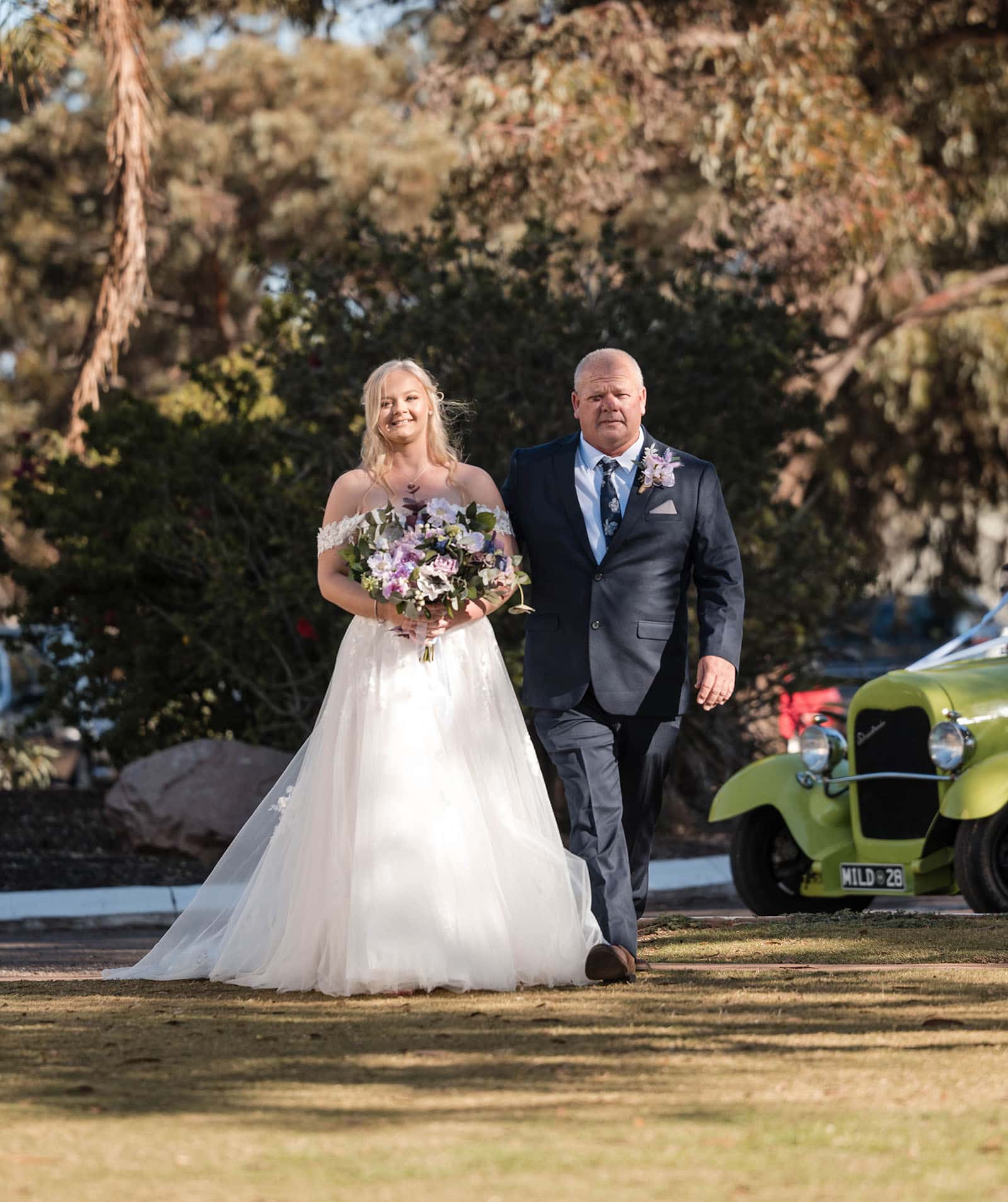 whyalla golf club wedding - tayla & stuart 25 Bride and Dad aproaching ceremony