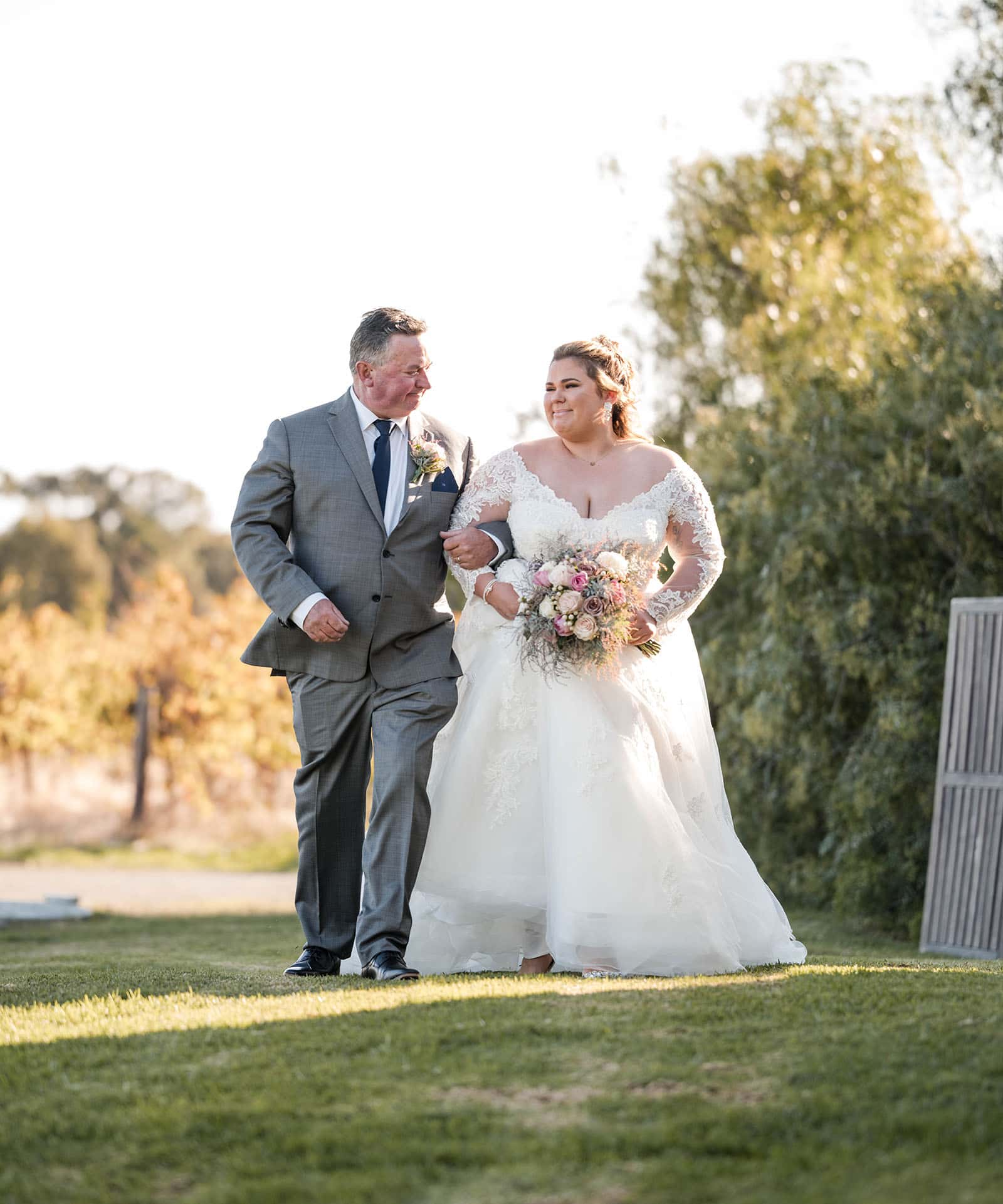 mclaren vale ekhidna wines wedding - kait & brayden 30 bride and Father walking toward ceremony