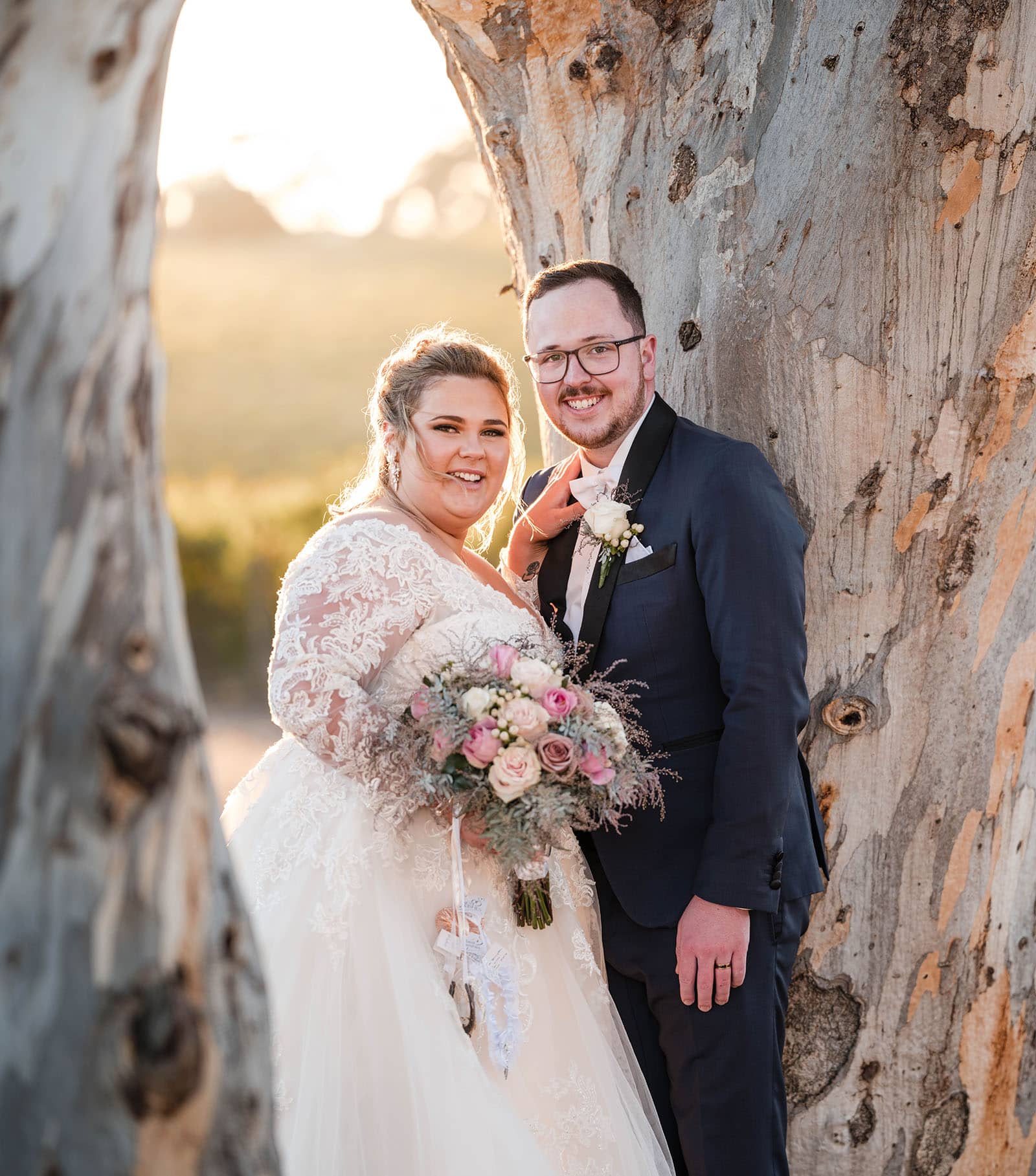 mclaren vale ekhidna wines wedding - kait & brayden 51 Bride and groom looking at camera between trees