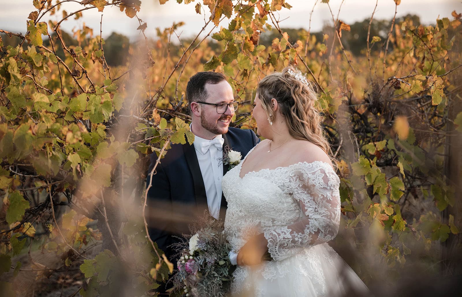 mclaren vale ekhidna wines wedding - kait & brayden 56 Bride and groom looking at one another in vines
