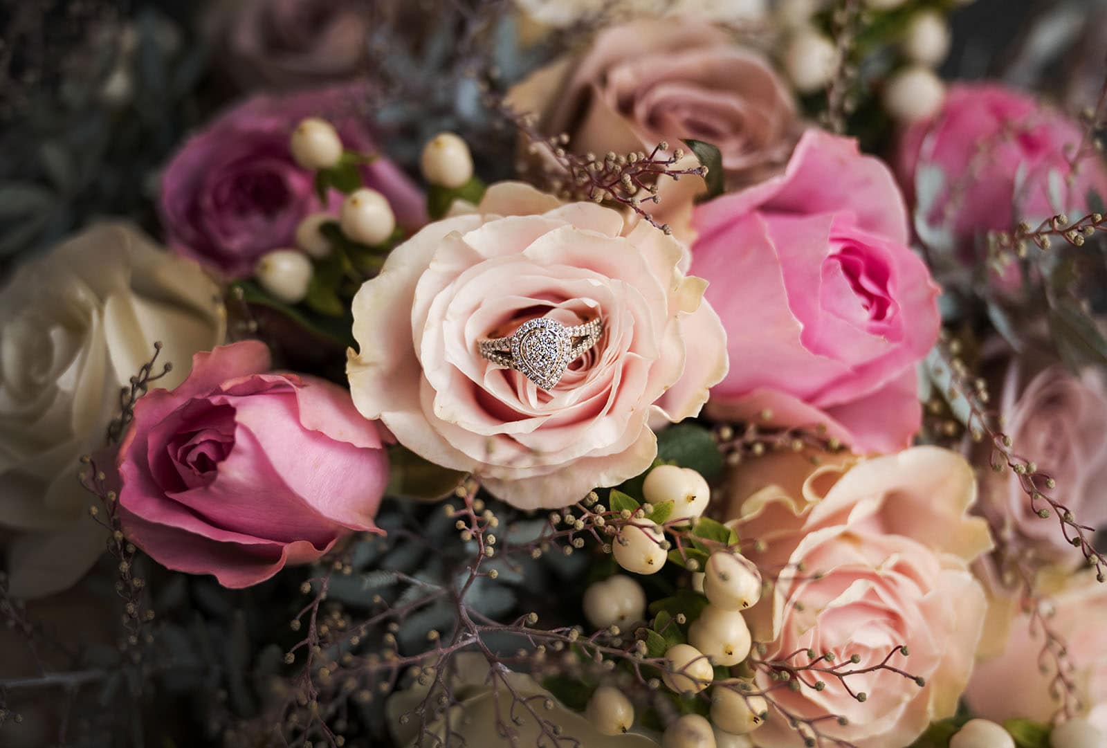mclaren vale ekhidna wines wedding - kait & brayden 14 Engagement ring in large rose bouquet