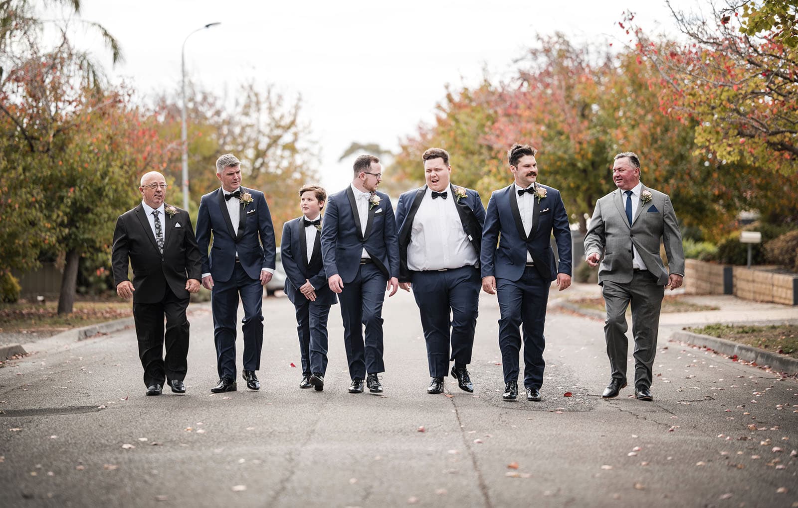 mclaren vale ekhidna wines wedding - kait & brayden 11 Groom and entourage walking down road