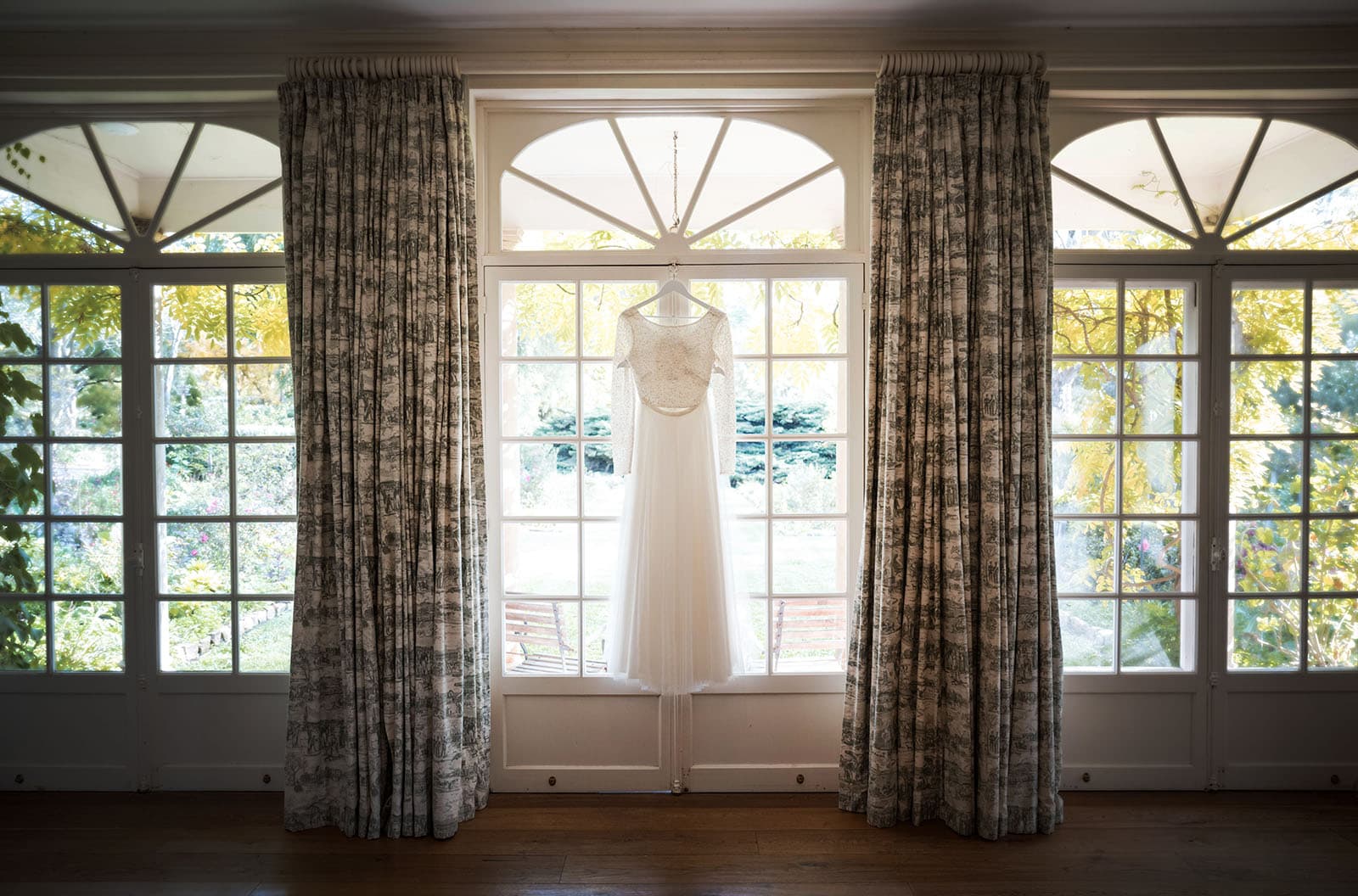 bridal eyewear: style tips for the ultimate wedding accessory 2 Wedding dress hanging at Al-Ru Wedding