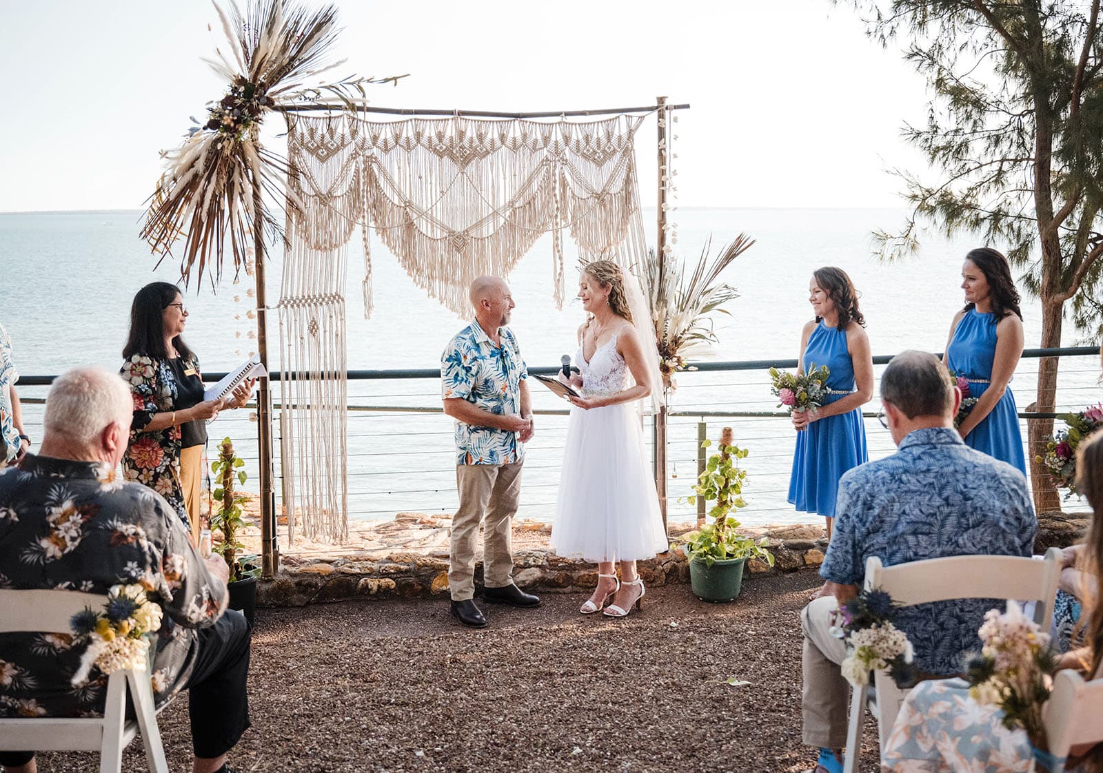 darwin's dudley point wedding - melanie & kerry 32 Bride and groom framed by square arbour