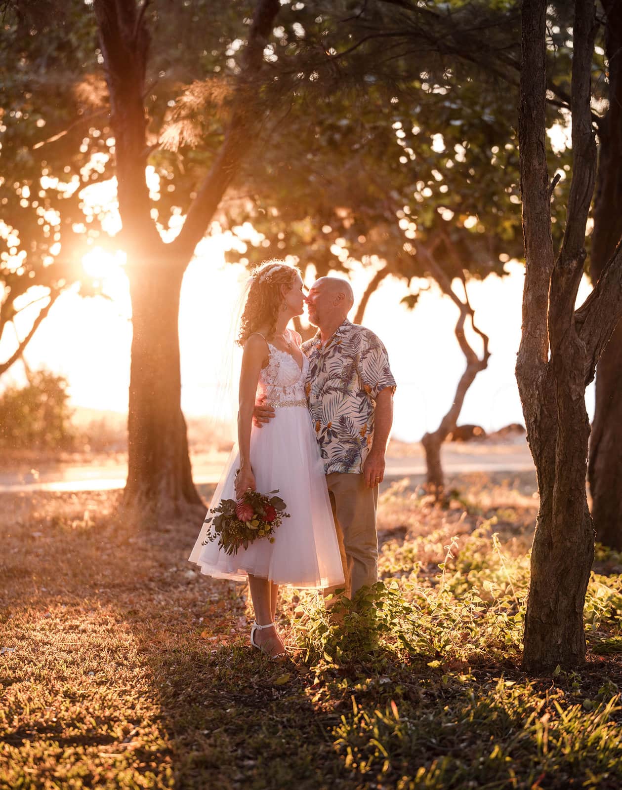 darwin's dudley point wedding - melanie & kerry 42 bride and groom with sunset in background