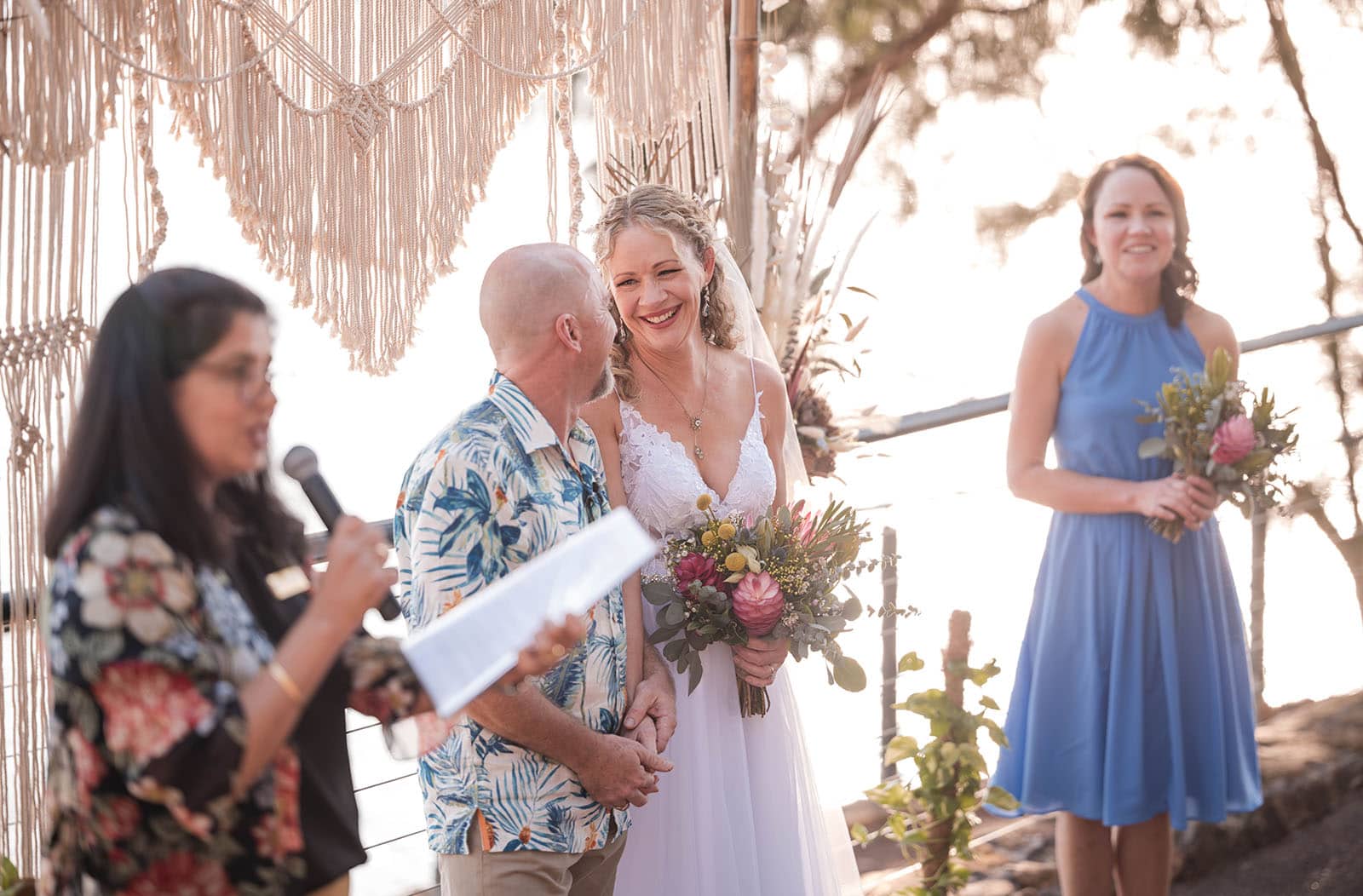darwin's dudley point wedding - melanie & kerry 30 Bride smiling at her groom during ceremony at Dudley Point