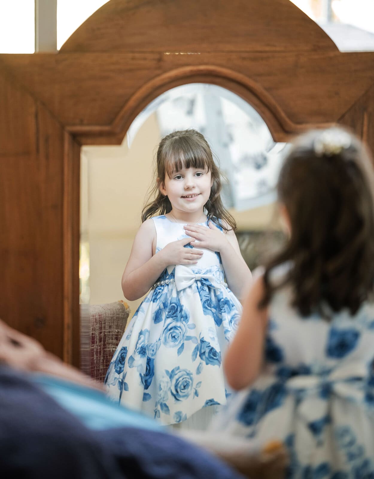 darwin's dudley point wedding - melanie & kerry 13 Flower girl admriing herself in mirror