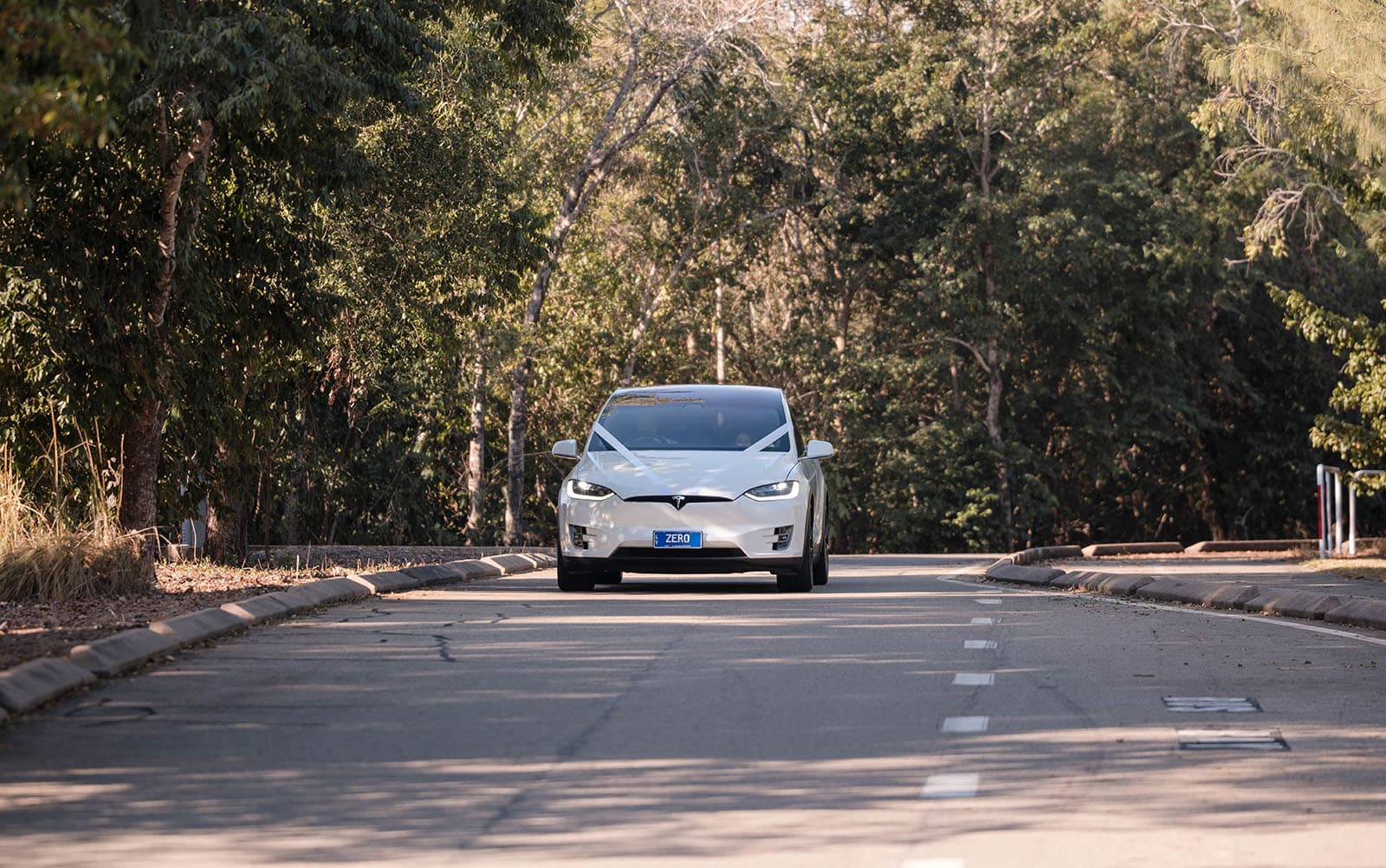 darwin's dudley point wedding - melanie & kerry 21 Tesla Arriving at Dudley Point Wedding