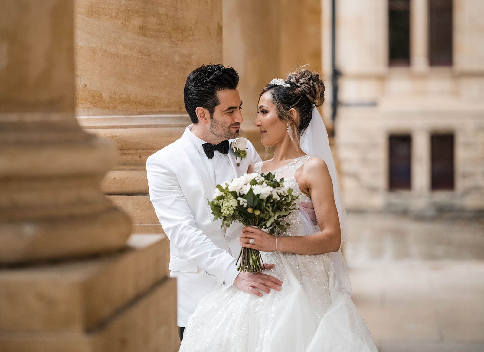 adelaide bridal photoshoot and reception - emre & sara 36 bridal embrace amongst pillars