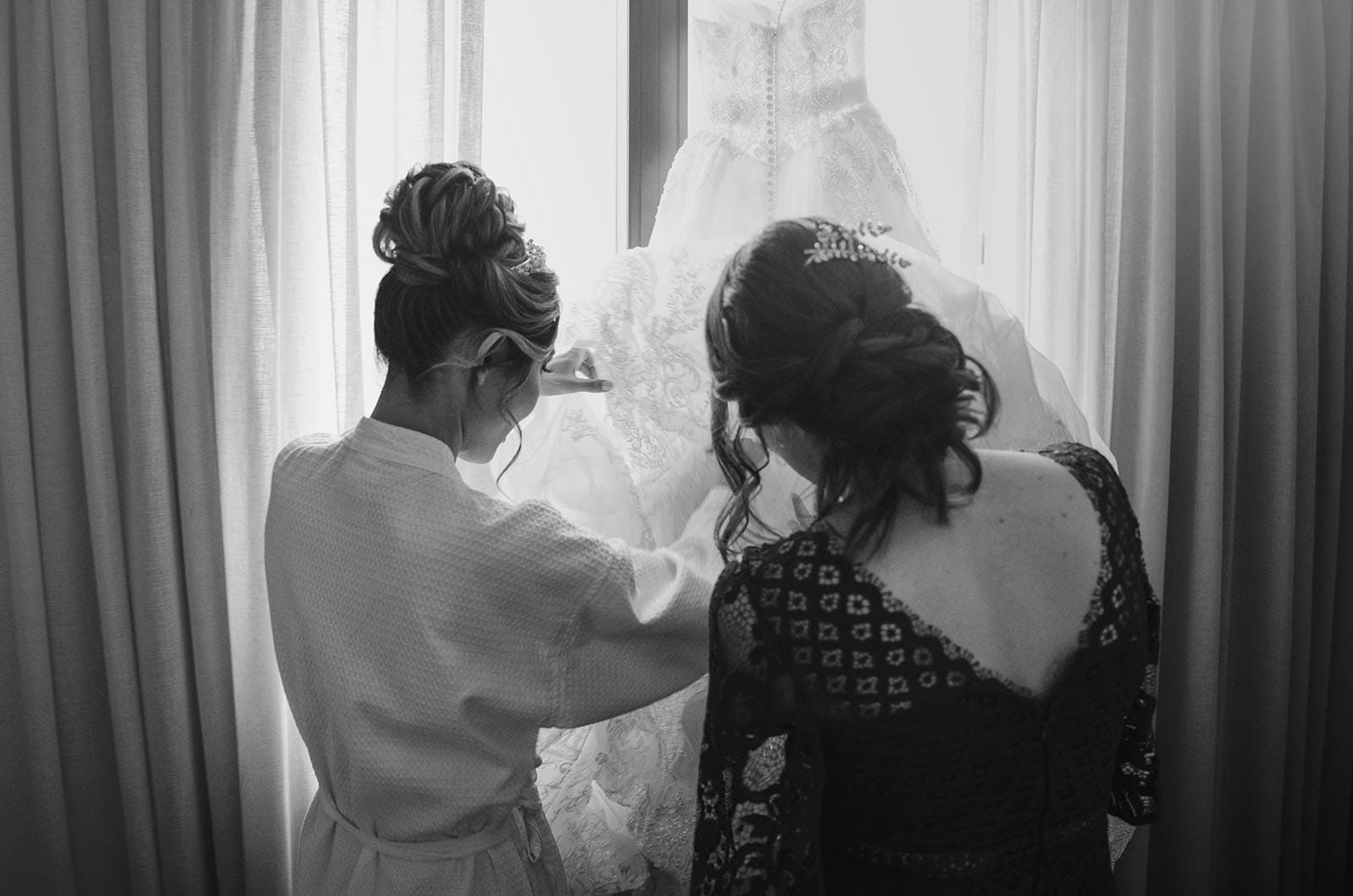 adelaide bridal photoshoot and reception - emre & sara 5 Bride and bridesmaid fiddling with dress