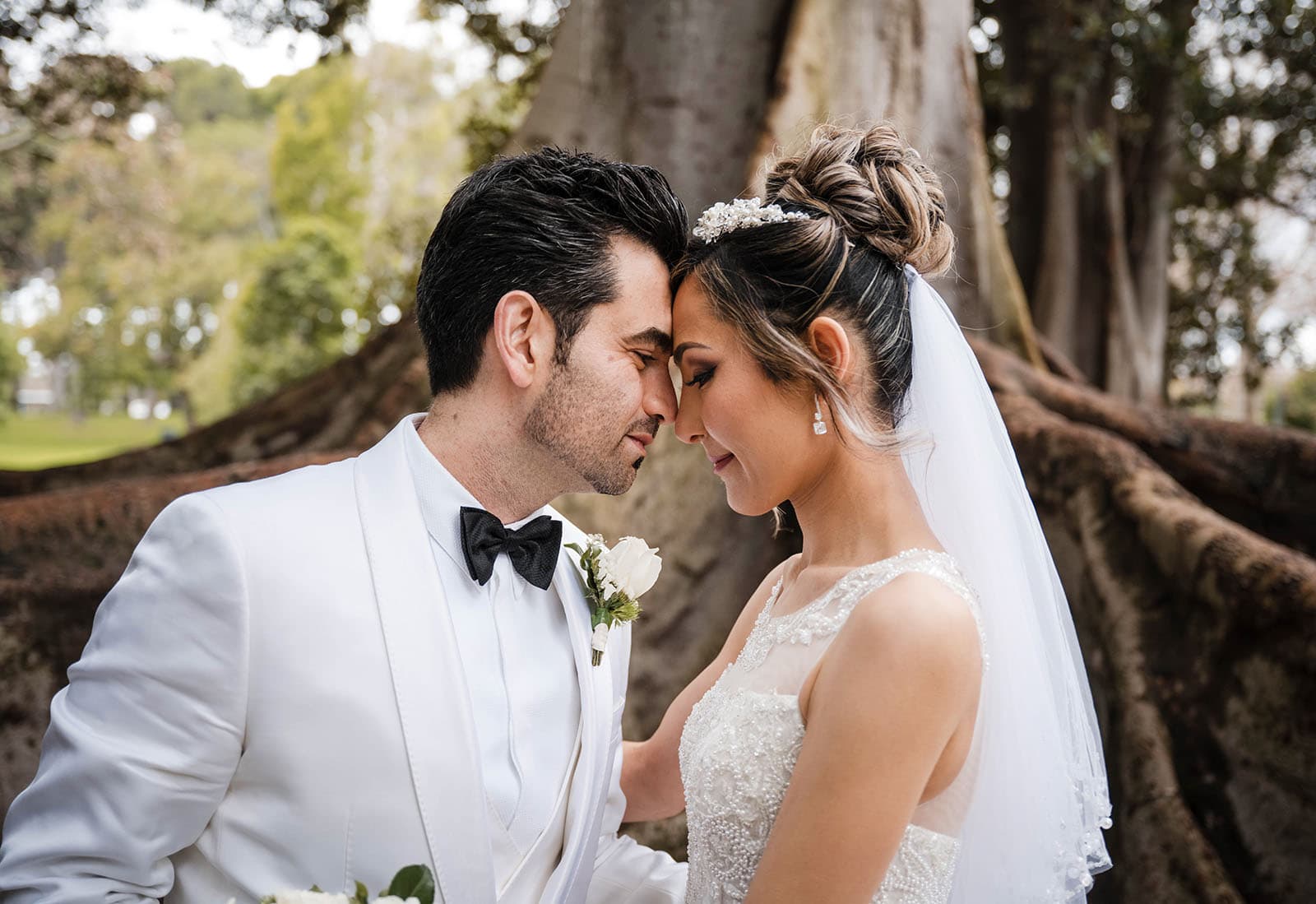 adelaide bridal photoshoot and reception - emre & sara 25 bride and groom head butt in front of tree