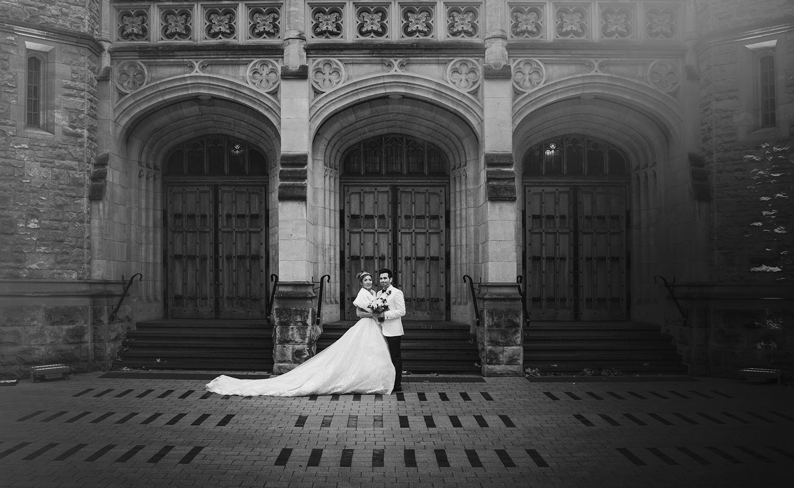adelaide bridal photoshoot and reception - emre & sara 43 bride and groom in front of Bonython hall's doors