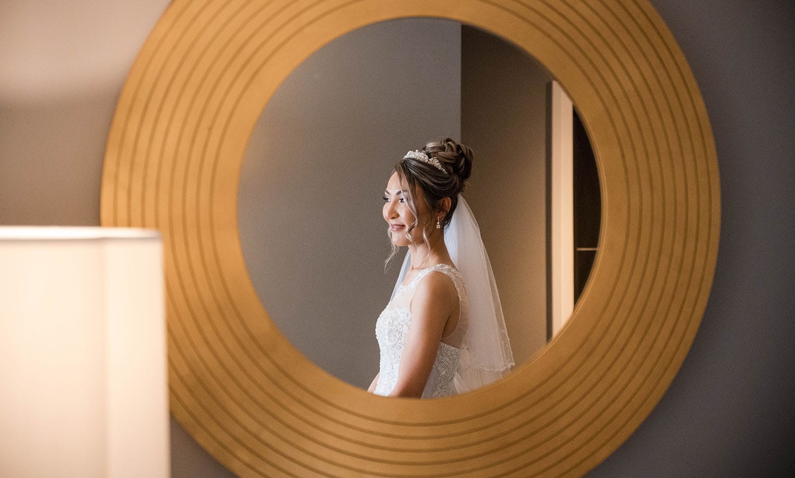 adelaide bridal photoshoot and reception - emre & sara 11 Bride framed by circular mirror