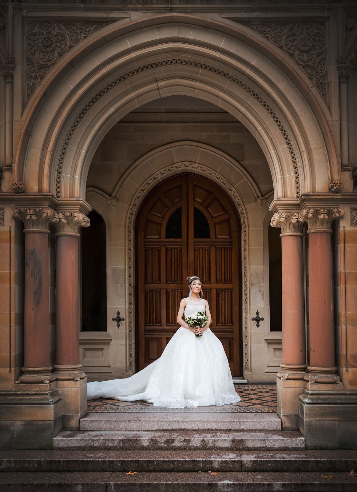 adelaide bridal photoshoot and reception - emre & sara 35 Bride standing alone in doorway