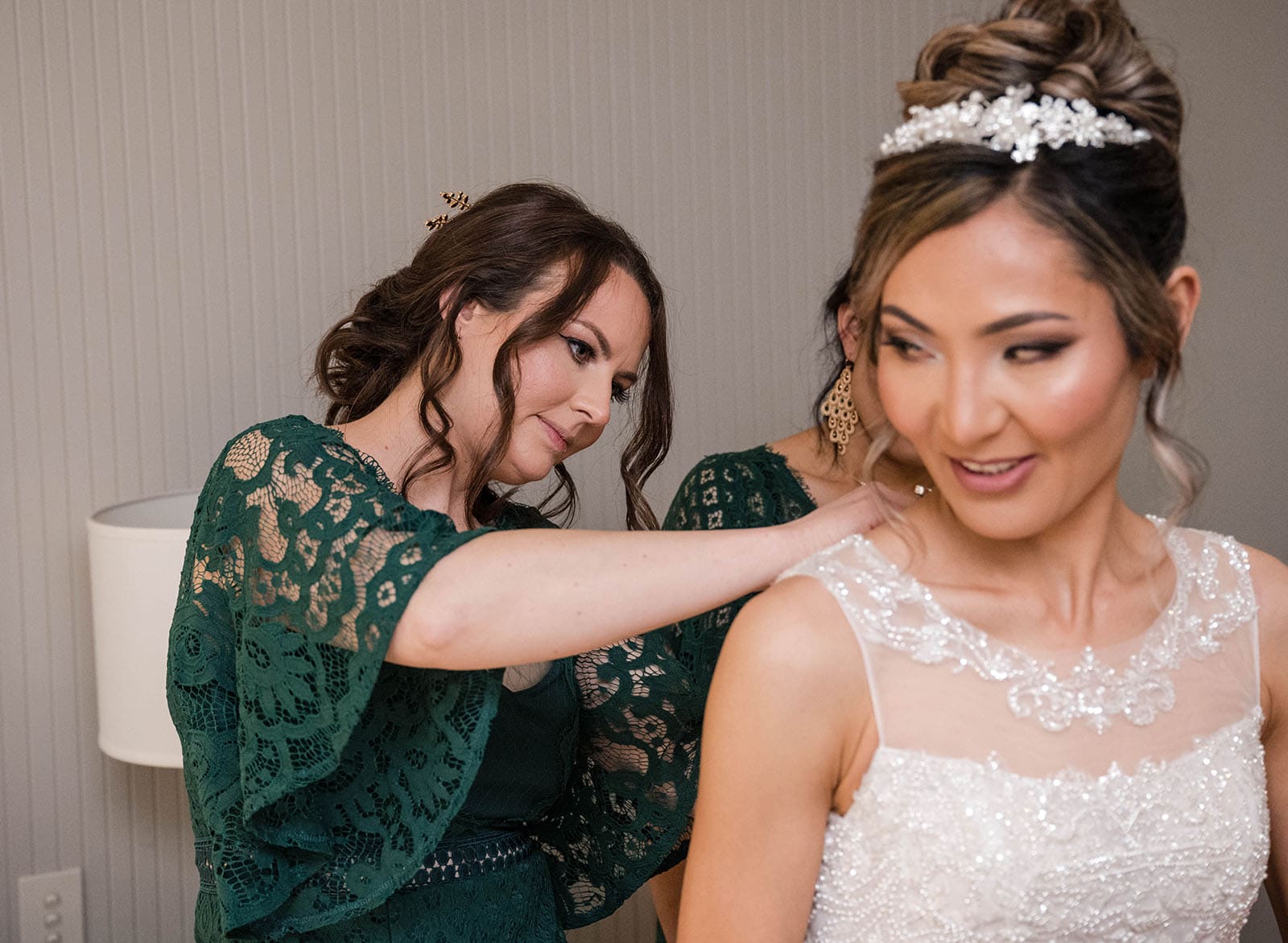 adelaide bridal photoshoot and reception - emre & sara 9 bridesmaid helping with bridal gown