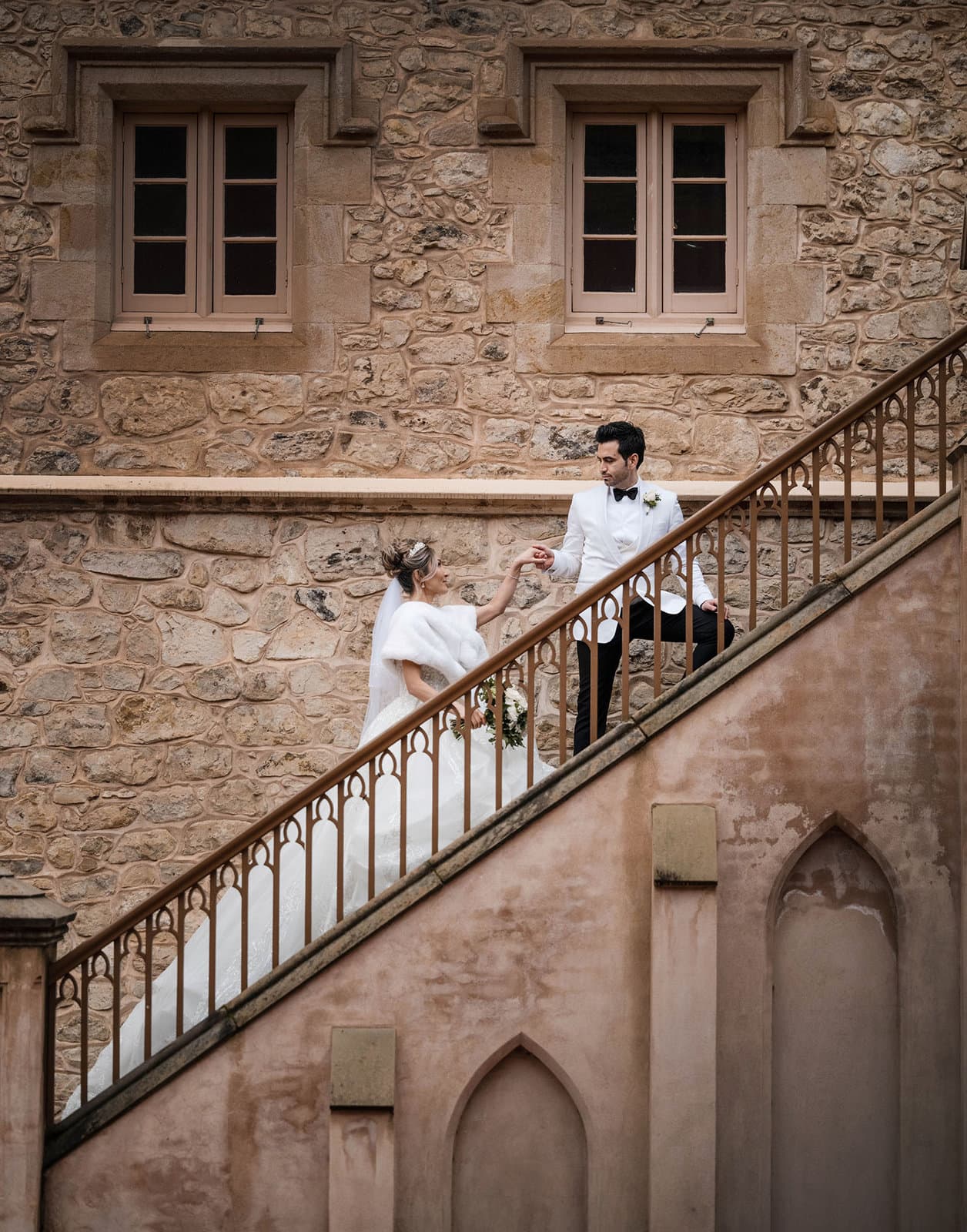 adelaide bridal photoshoot and reception - emre & sara 38 Groom leading bride up stars