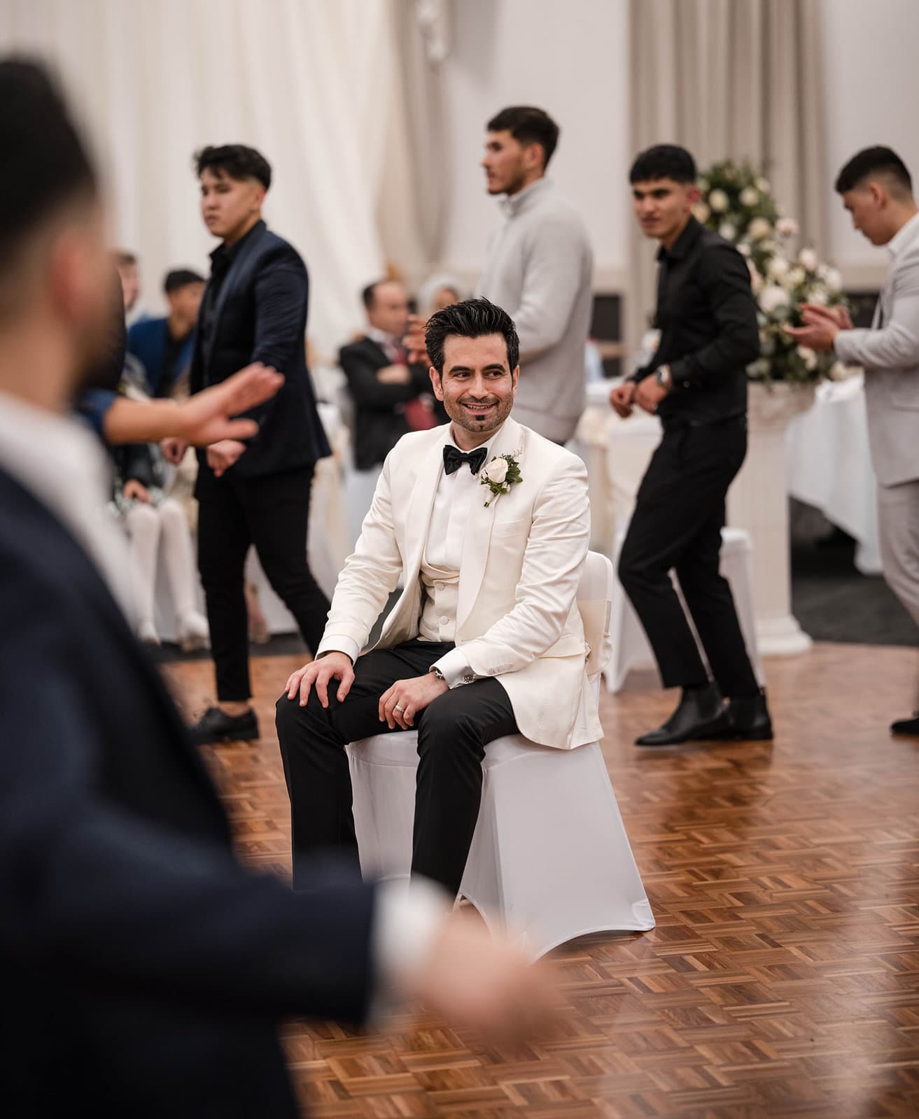 adelaide bridal photoshoot and reception - emre & sara 61 Groom on chair in middle of dance