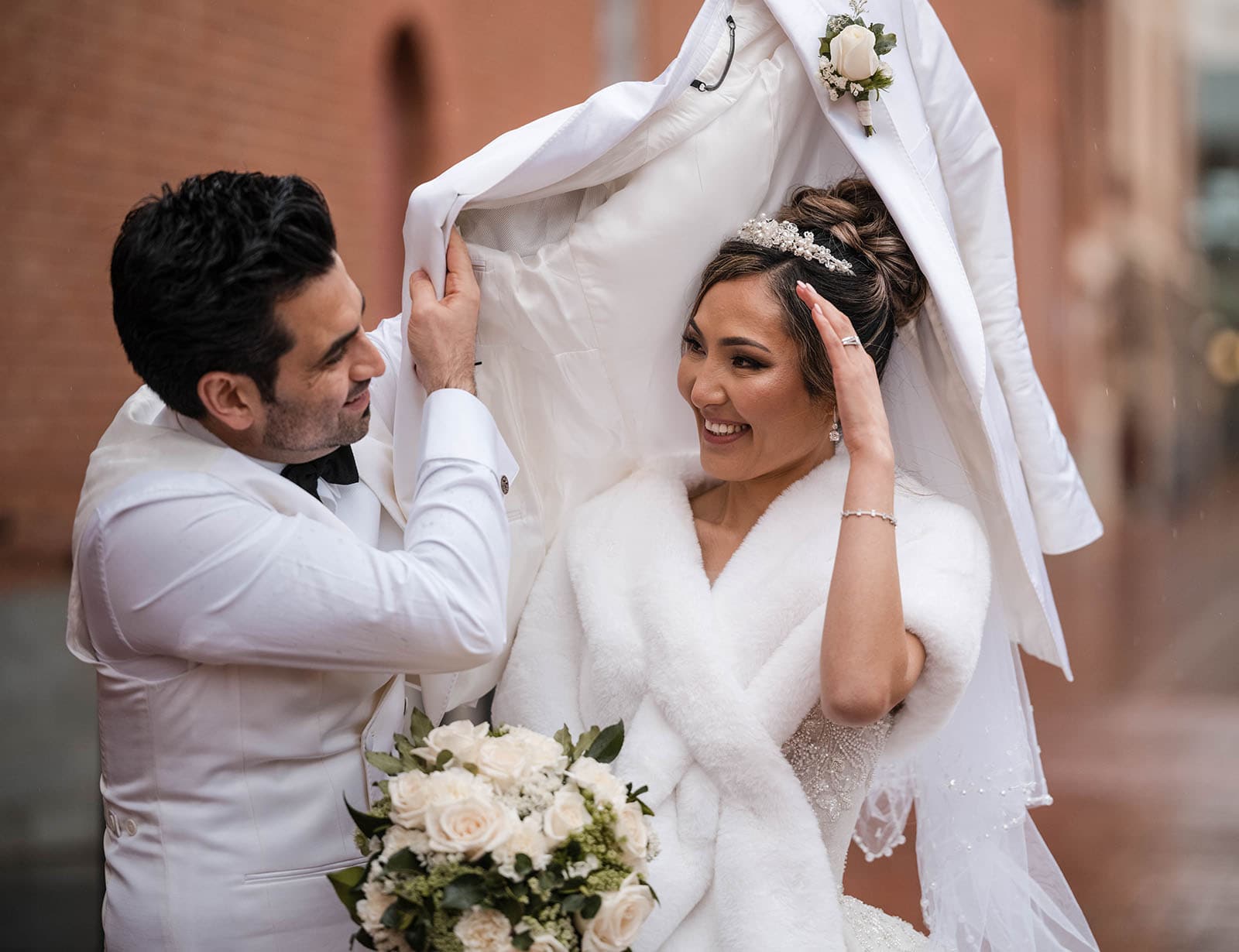 adelaide bridal photoshoot and reception - emre & sara 41 Groom sheilding bride from rain