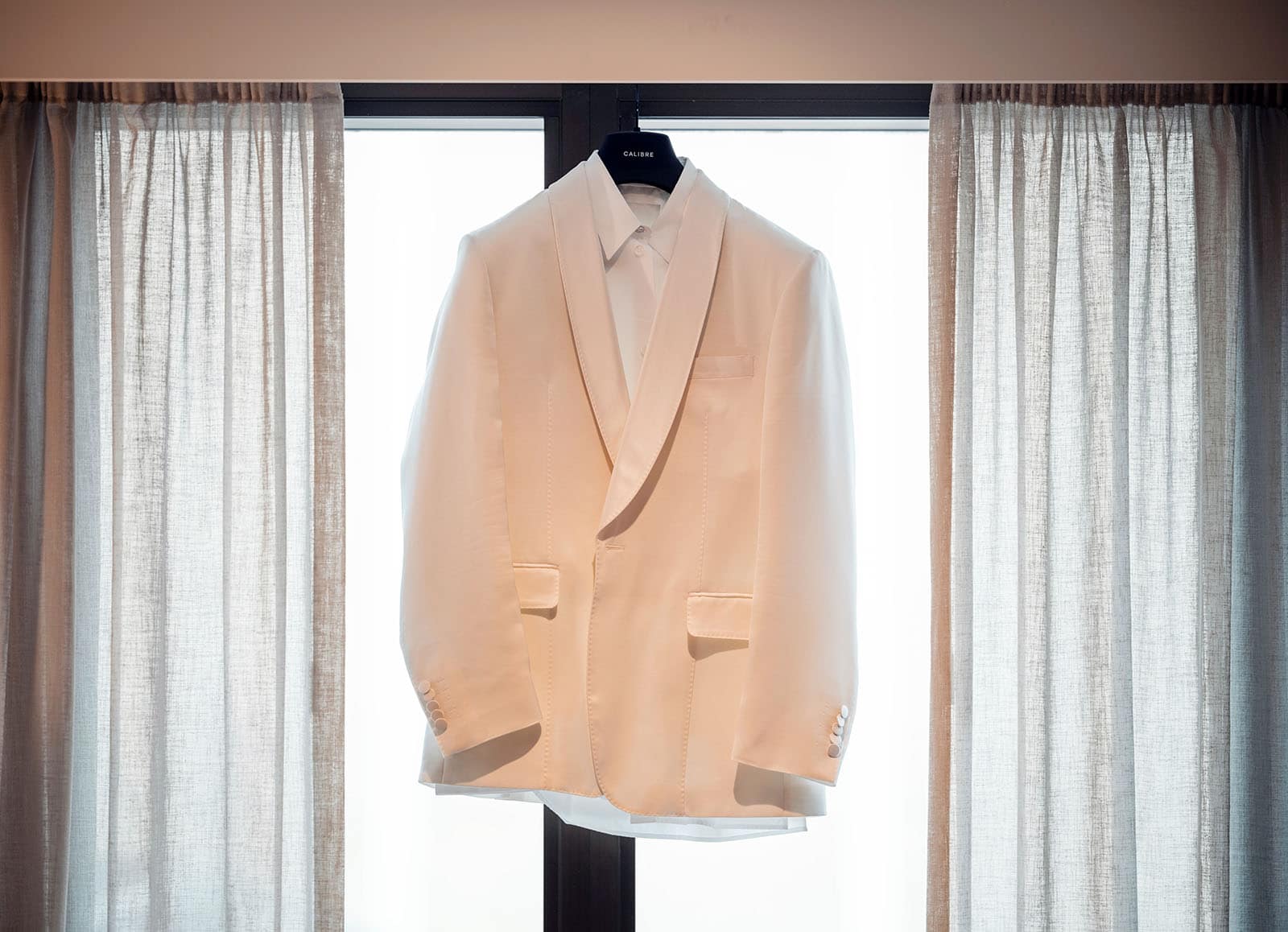 adelaide bridal photoshoot and reception - emre & sara 1 White suit jacket