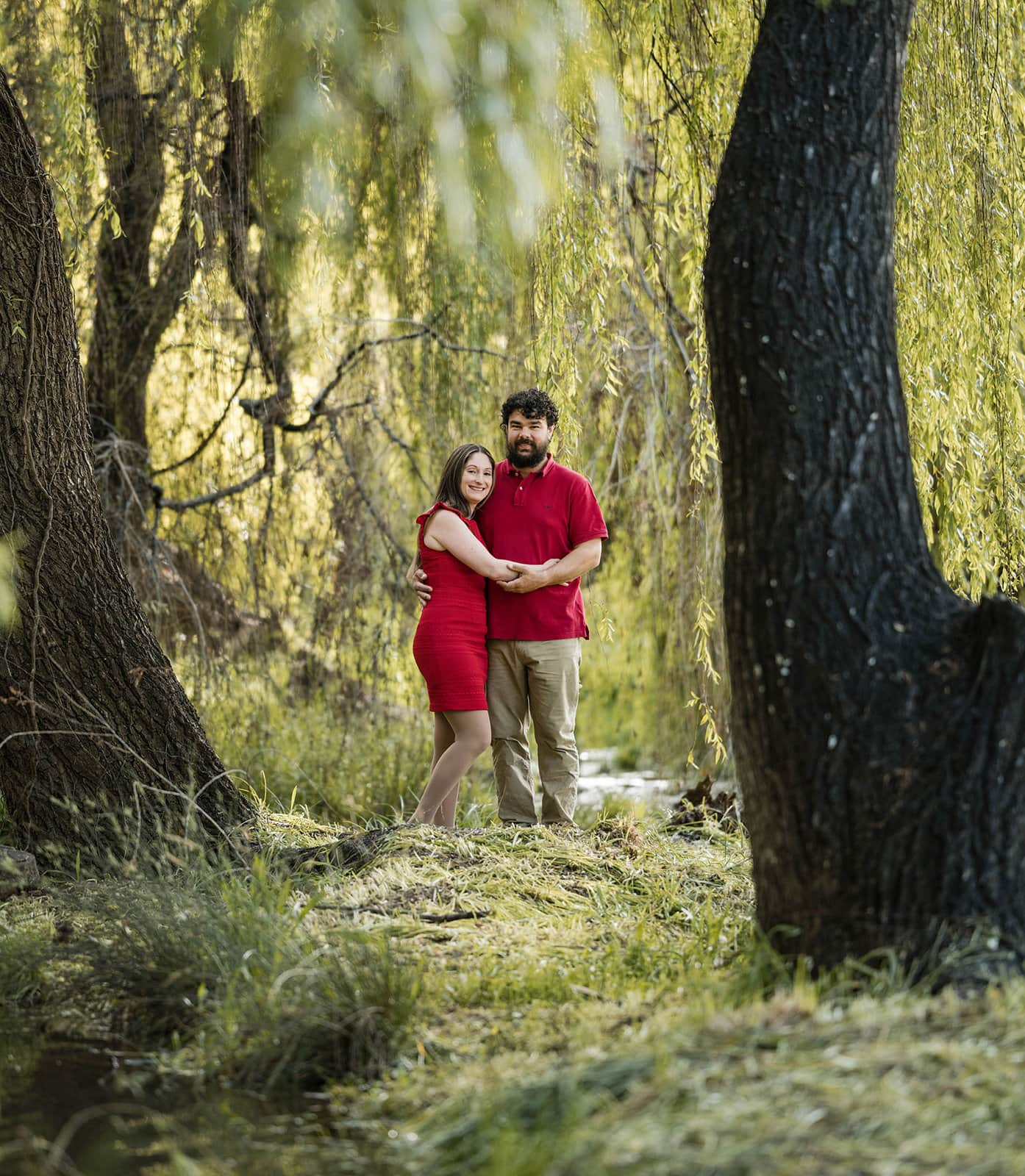 fountain valley reserve family shoot - shaw family 11 Mum and Dad standing in the green trees