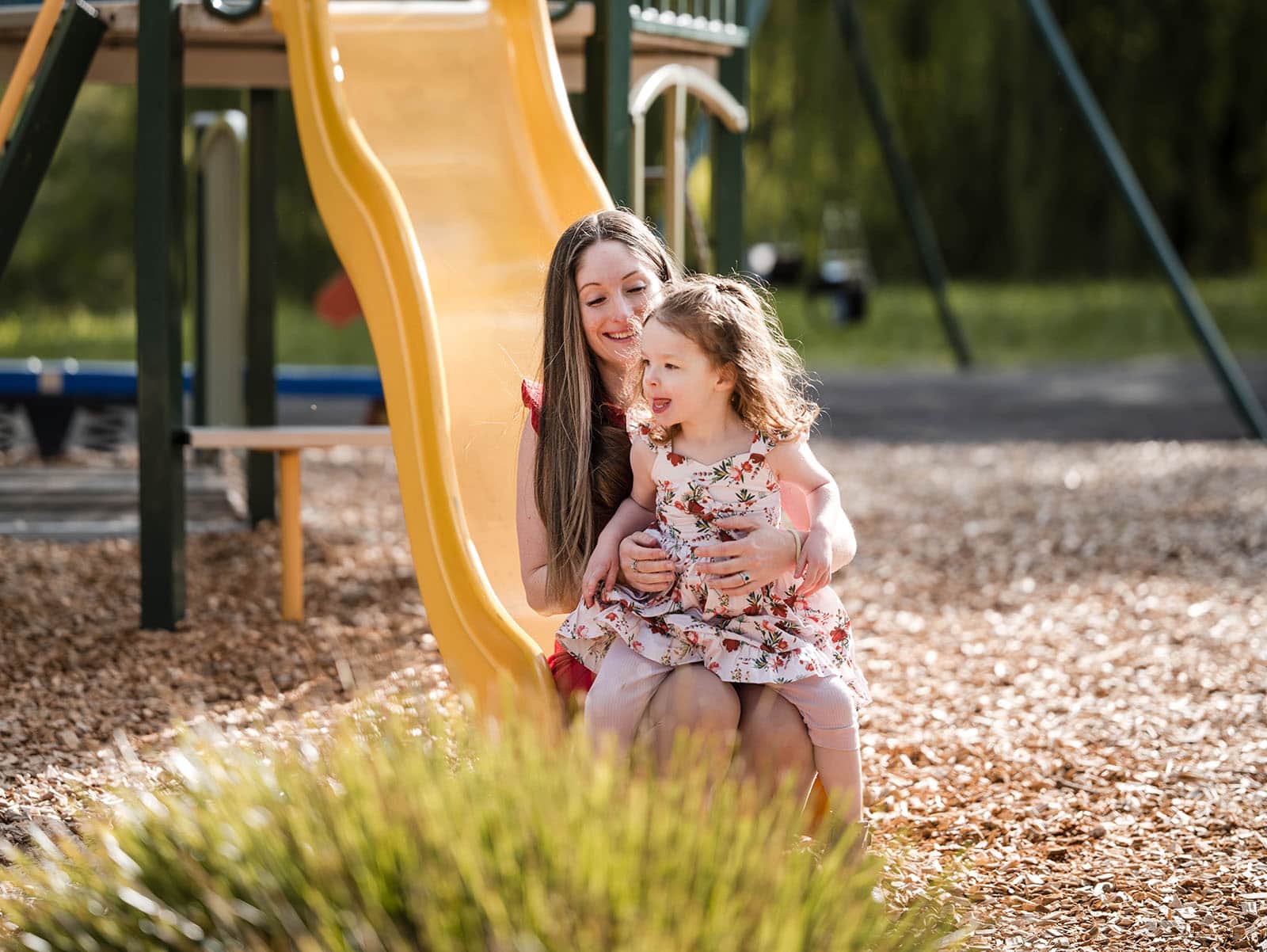 fountain valley reserve family shoot - shaw family 16 Mum and little one on slide