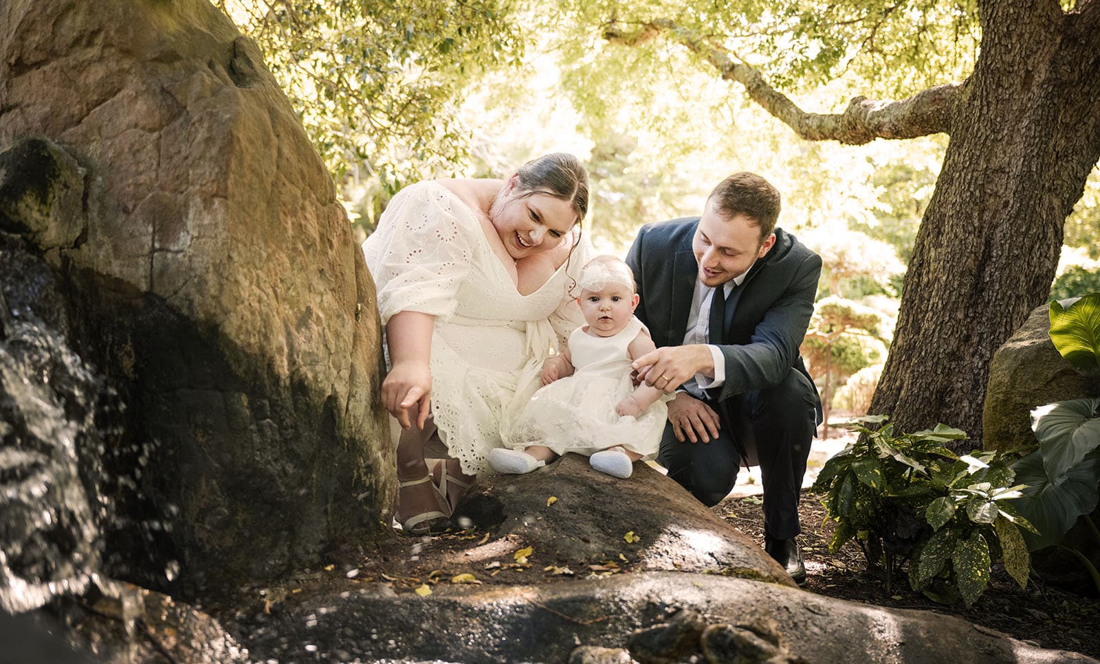 marriages registration office wedding - dayna & alex 23 Bridal couple showing baby the waterfall