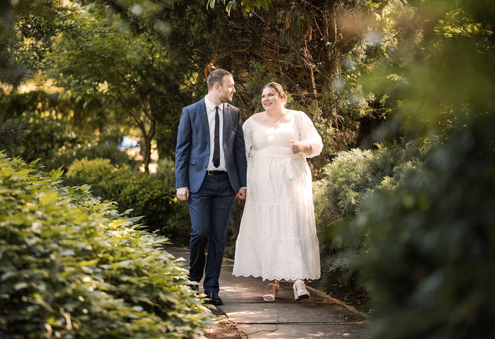 marriages registration office wedding - dayna & alex 18 Bridal couple walking in himeji gardens