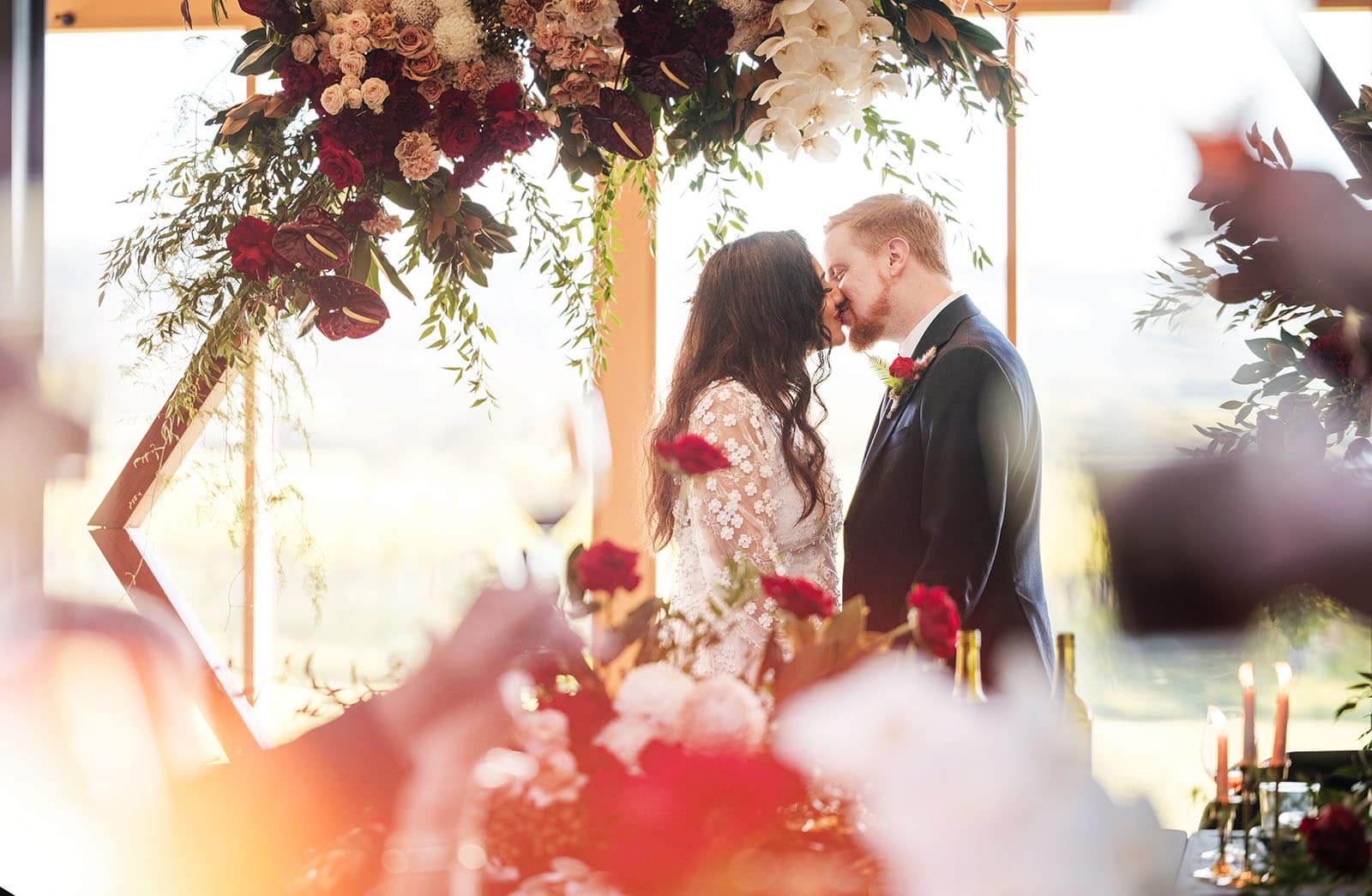 ekhidna winery wedding - chami & bryce 59 Bridal kiss through cheers