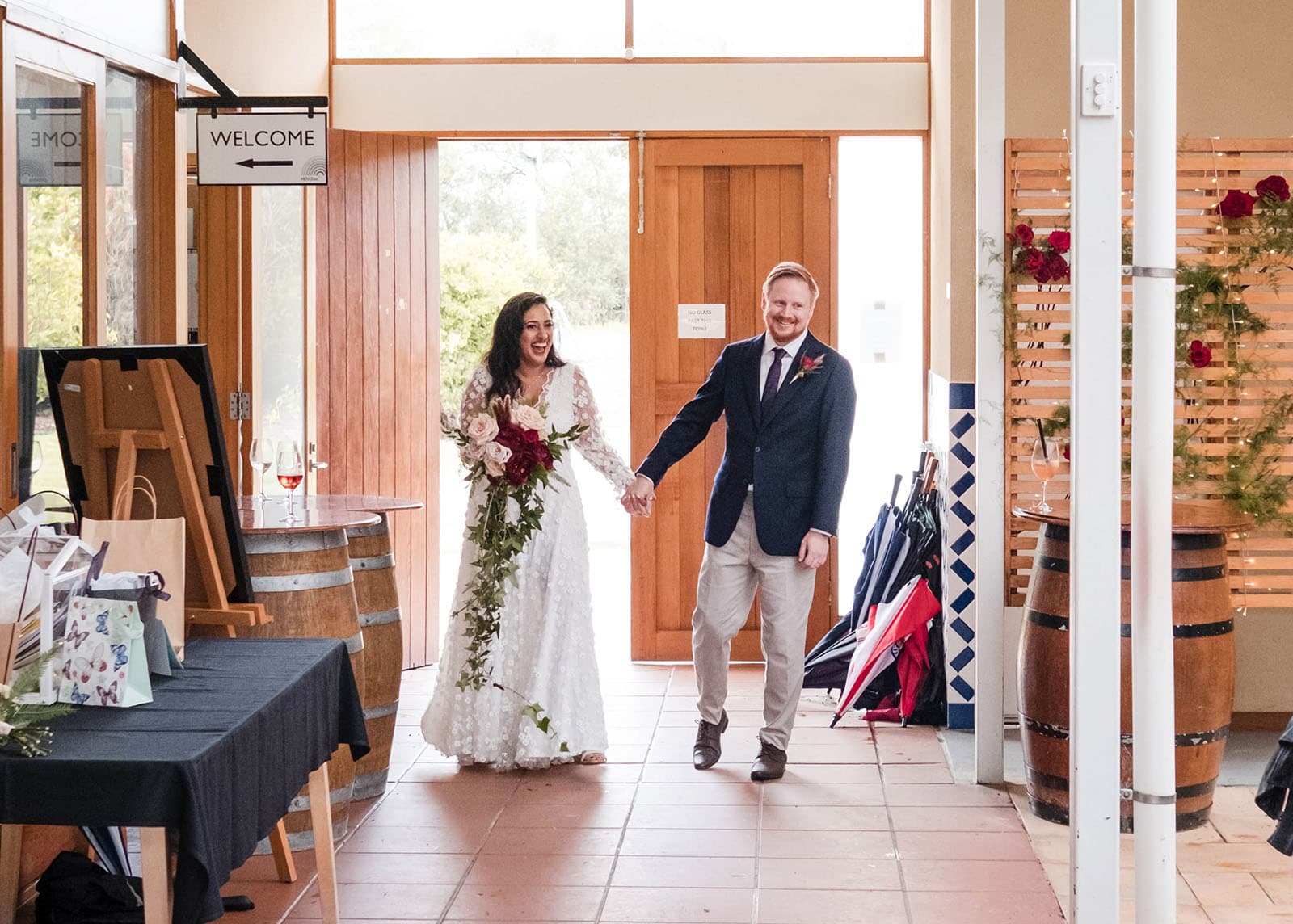 ekhidna winery wedding - chami & bryce 56 bride and groom entrance at Ekhidna wines