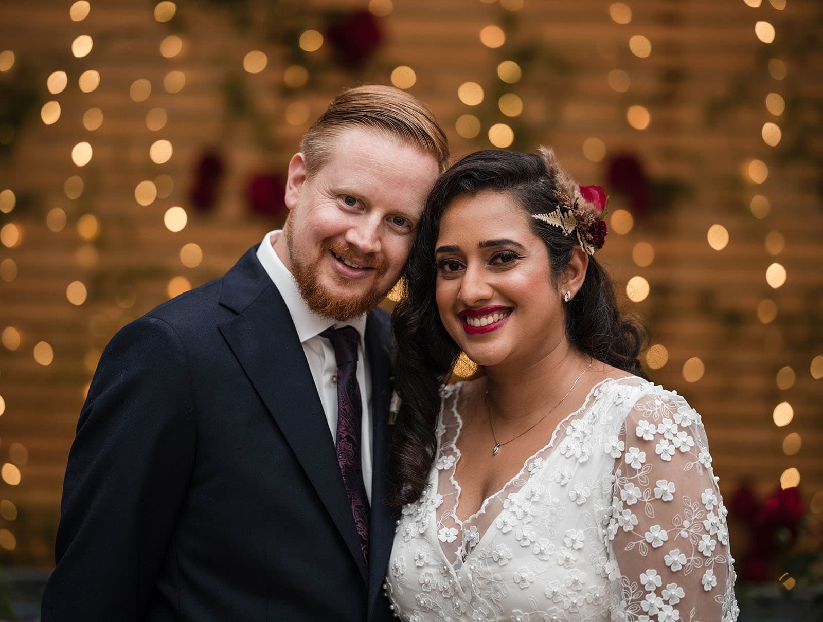 ekhidna winery wedding - chami & bryce 28 Bride and groom in front of fairy lights