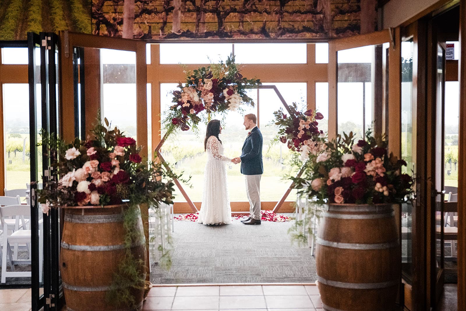 ekhidna winery wedding - chami & bryce 27 Bride and groom practising at the arbour