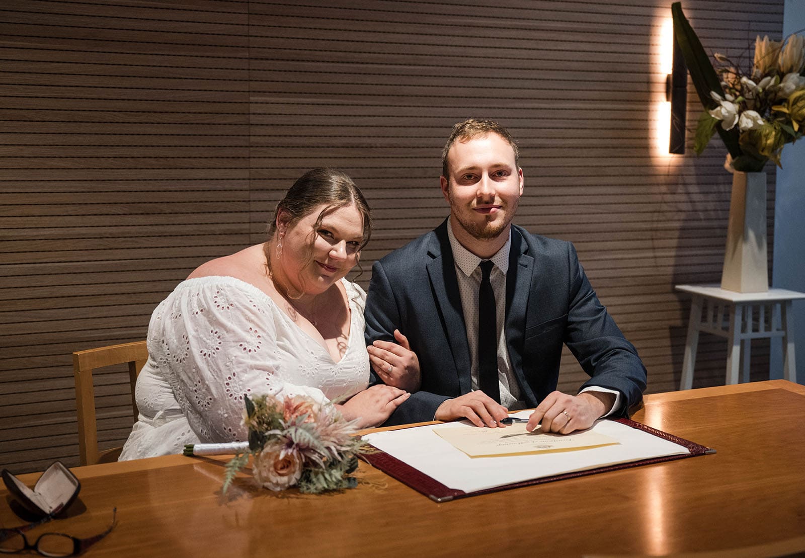 marriages registration office wedding - dayna & alex 8 Bride and groom sitting together at table