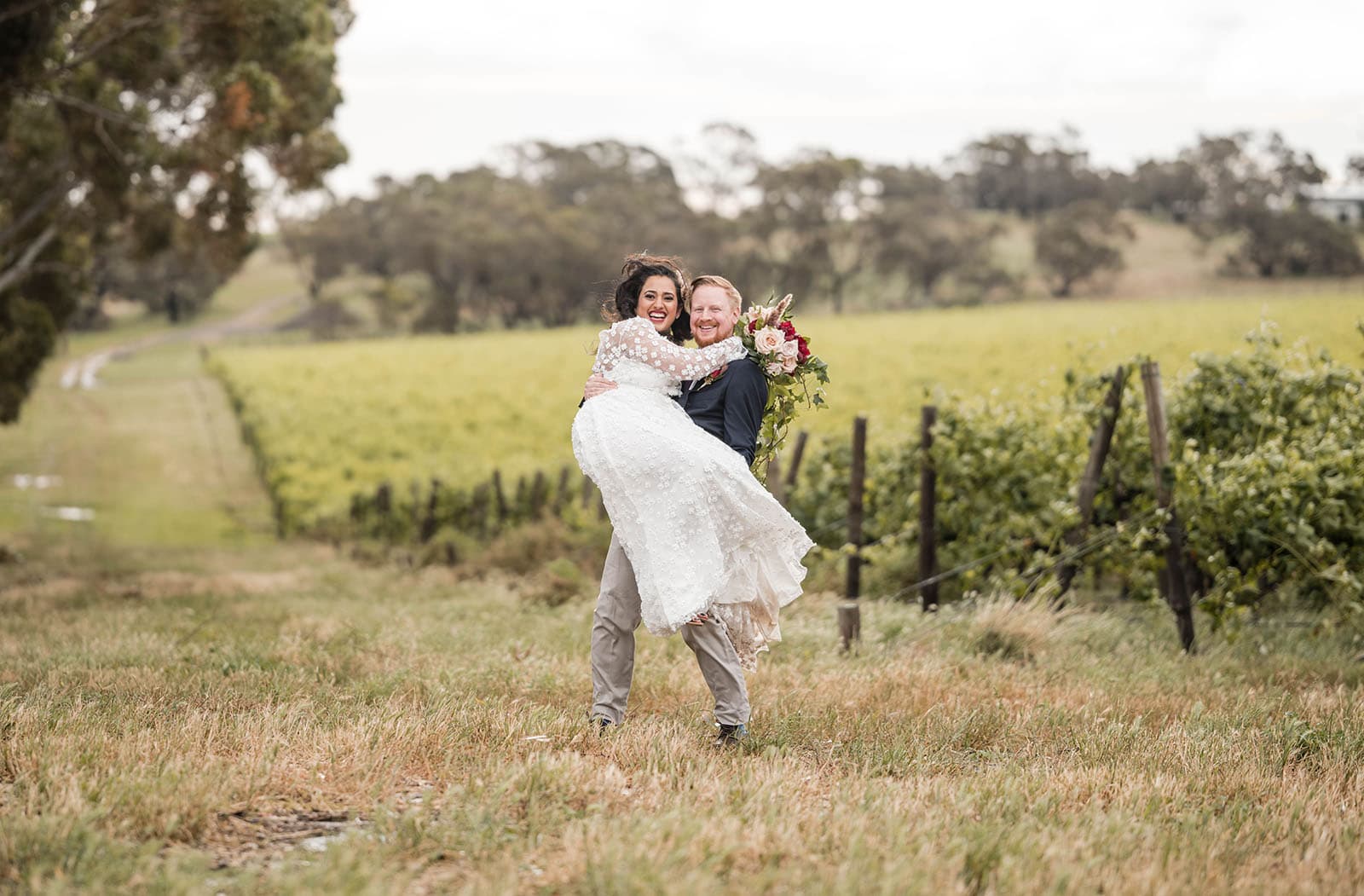 ekhidna winery wedding - chami & bryce 42 Groom lifting bride