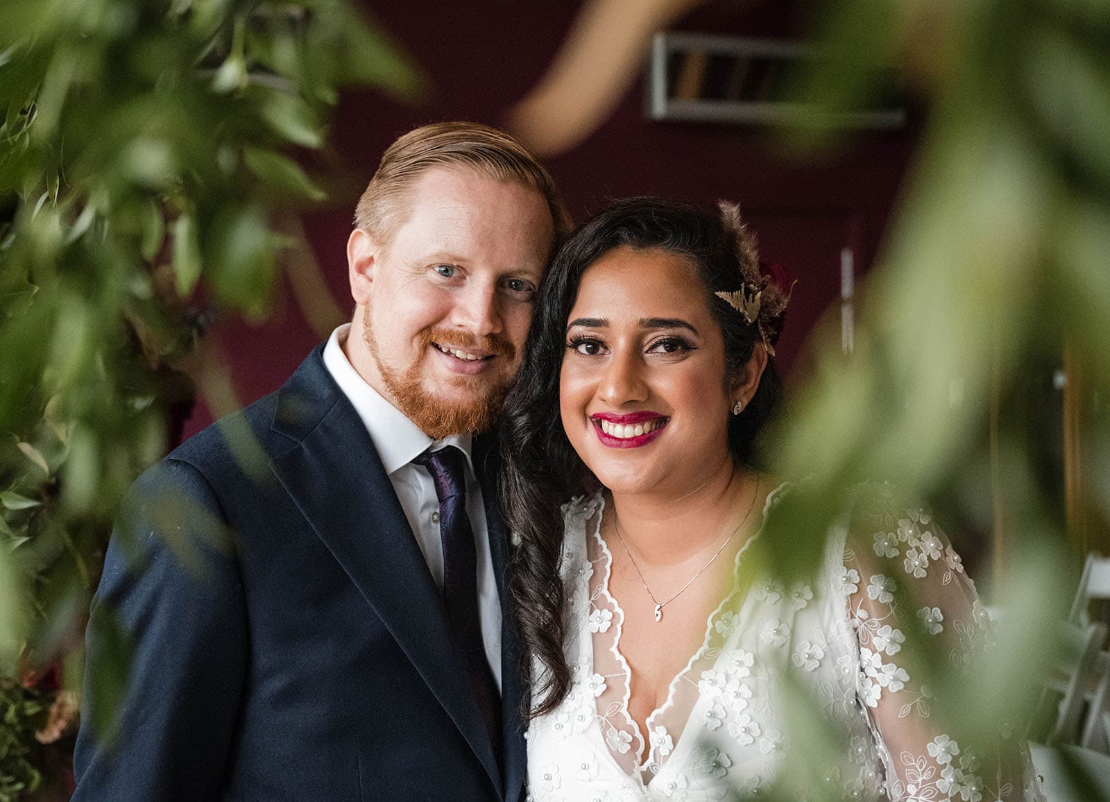 ekhidna winery wedding - chami & bryce 26 Smiling bride and groom through flowers