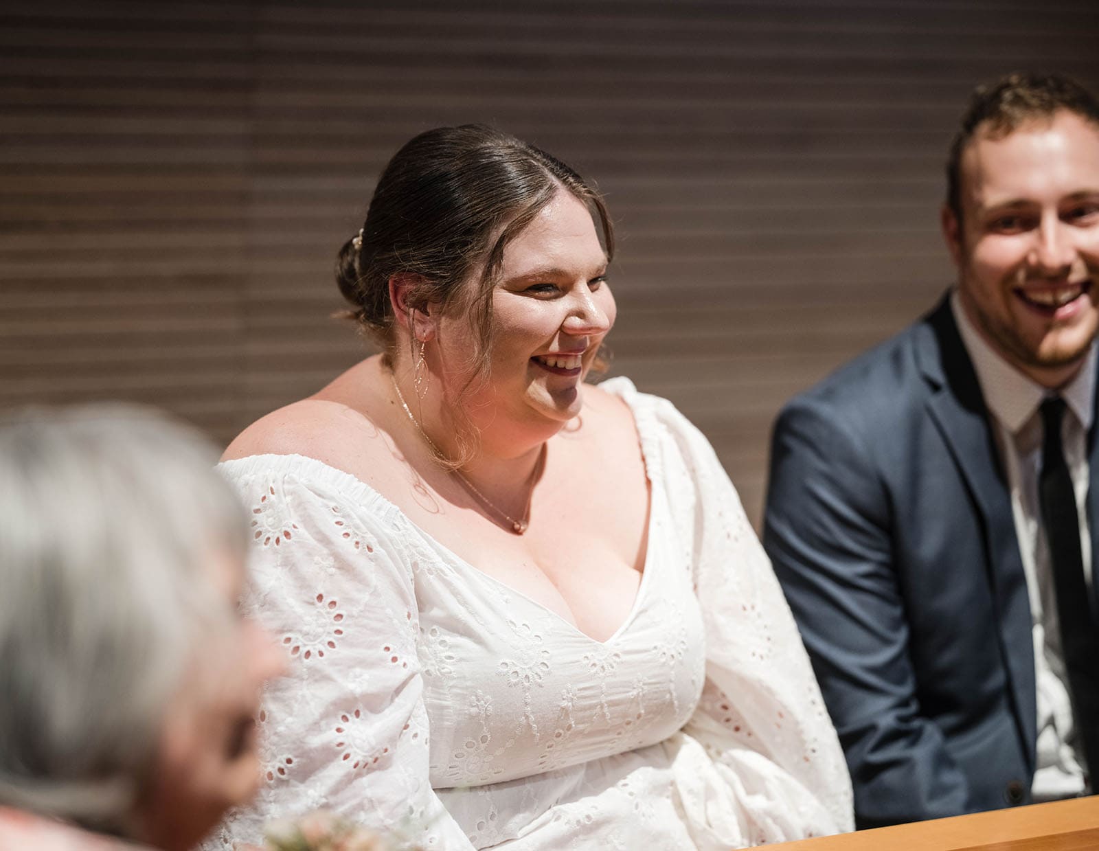 marriages registration office wedding - dayna & alex 7 Smiling bride under lights