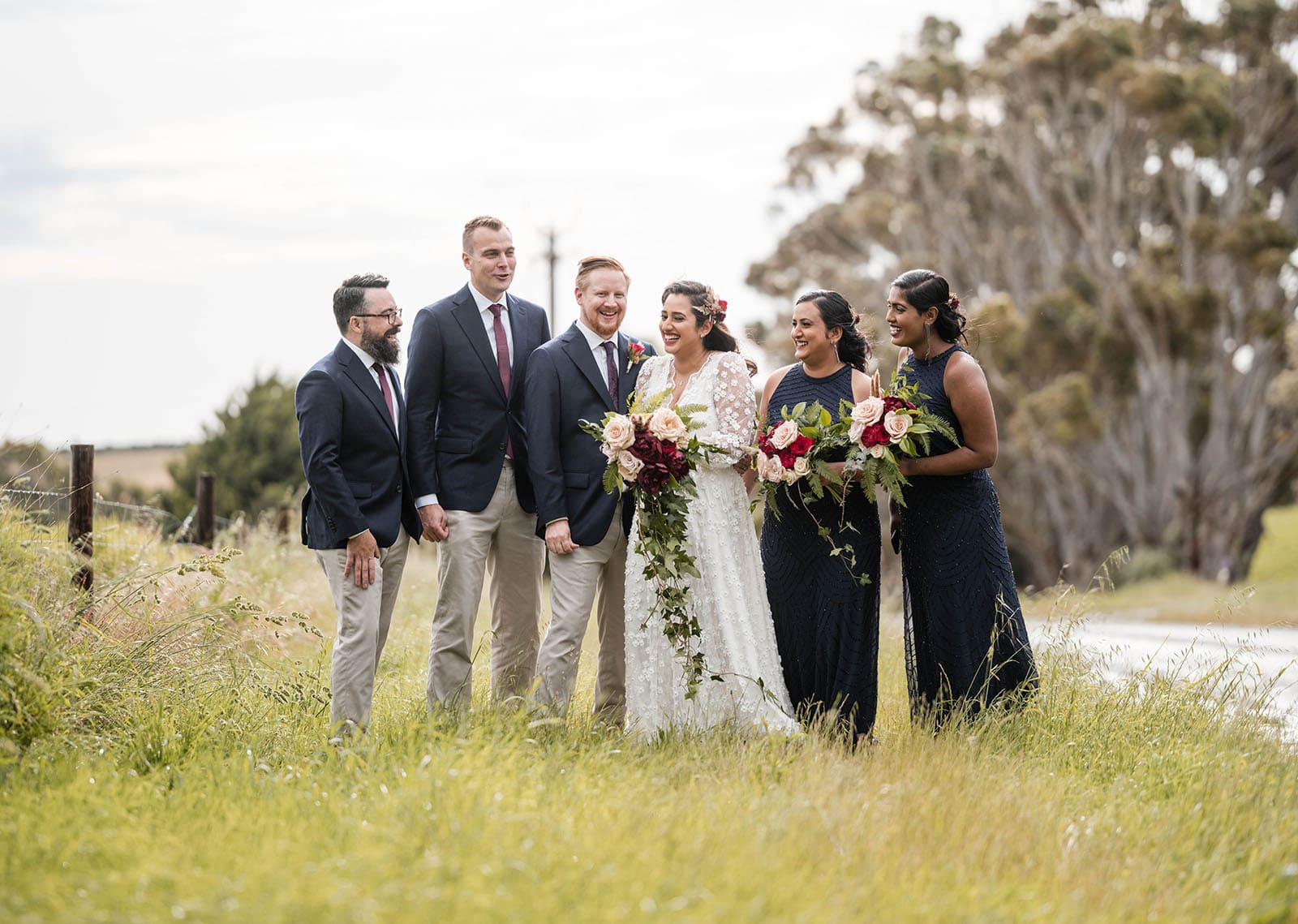 ekhidna winery wedding - chami & bryce 38 Wedding party in wet long grass