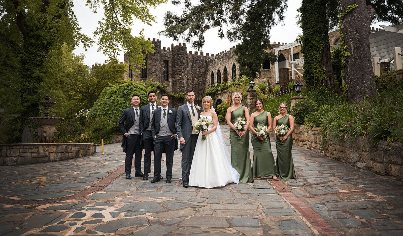 the manor basket range wedding - cassie & danny 52 Bridal party in front of Manor Basket range