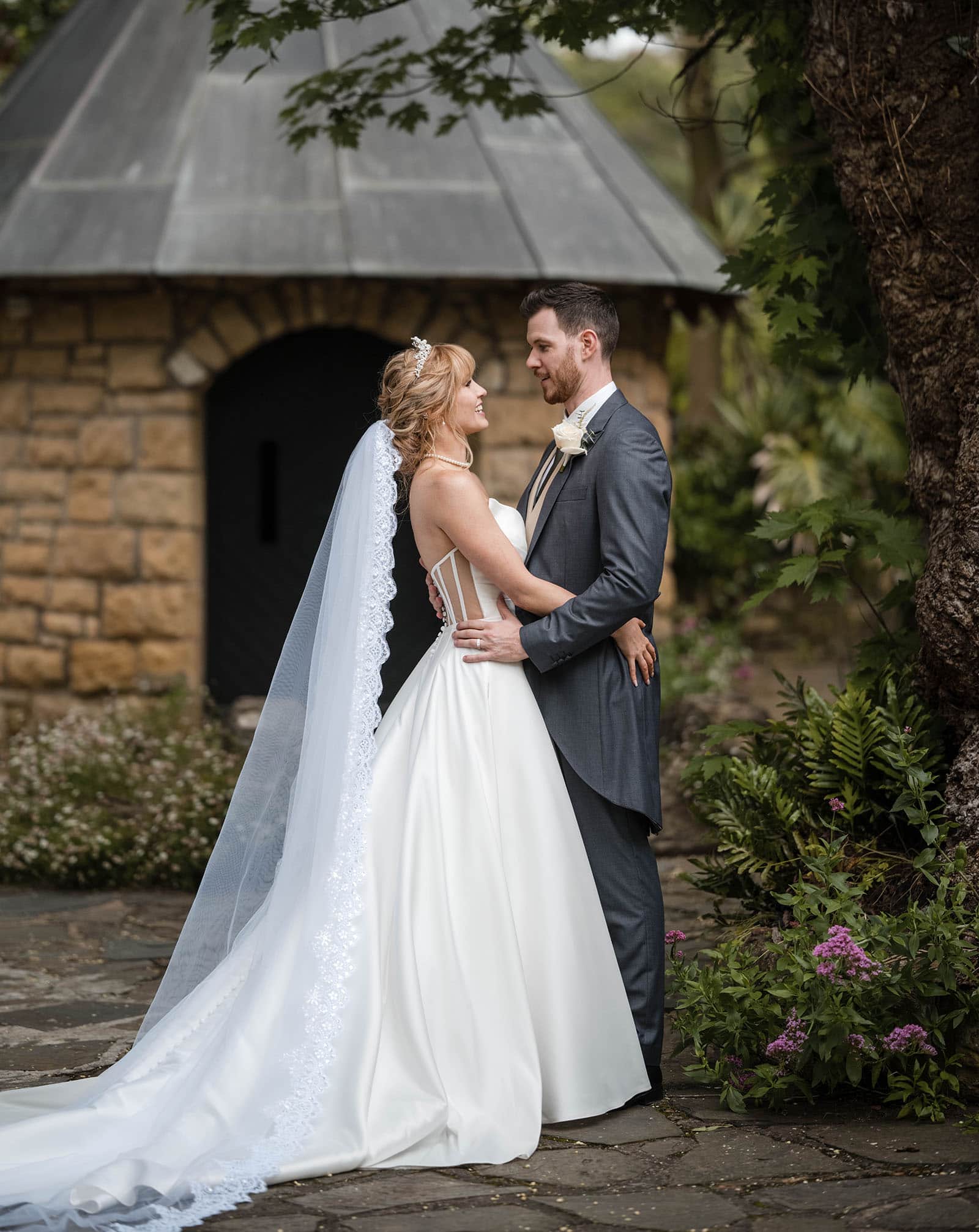the manor basket range wedding - cassie & danny 46 Bride and groom standing in front of chapel