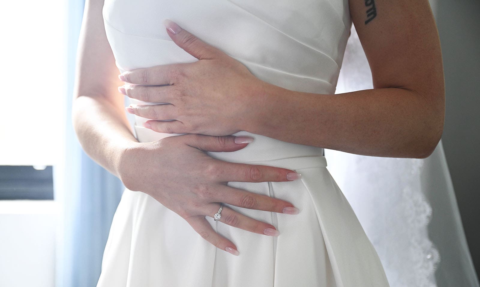 the manor basket range wedding - cassie & danny 24 Bride hands across front