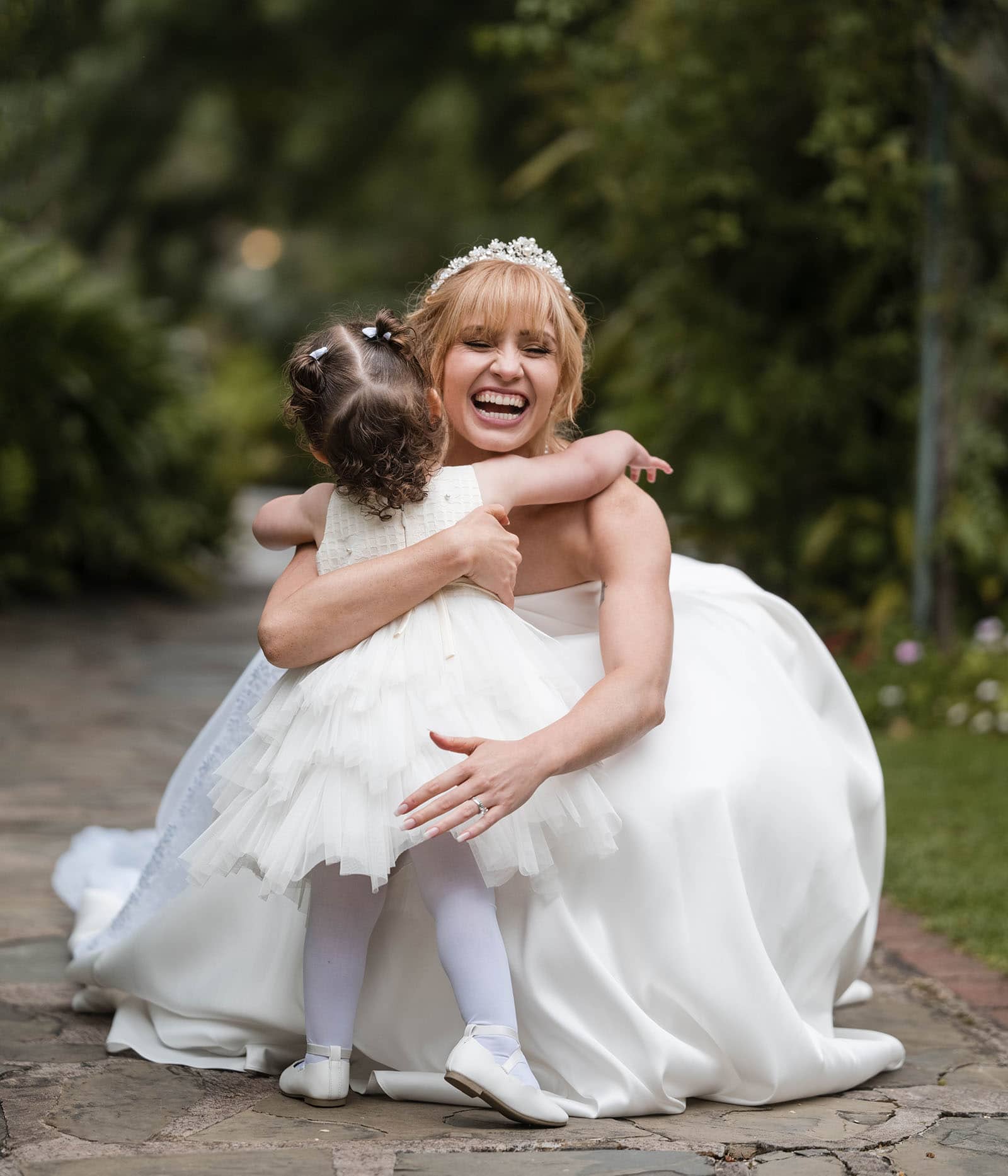 the manor basket range wedding - cassie & danny 45 Bride hugs with little girl
