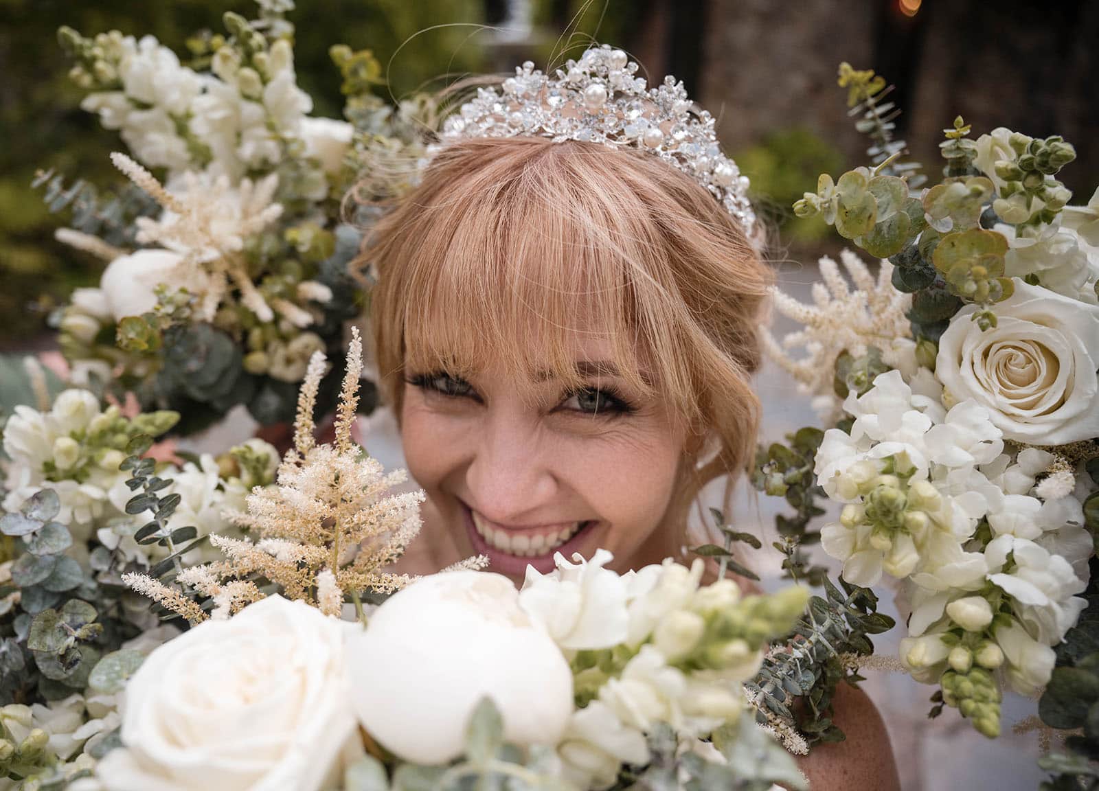 the manor basket range wedding - cassie & danny 49 Bride surrounded by flowers