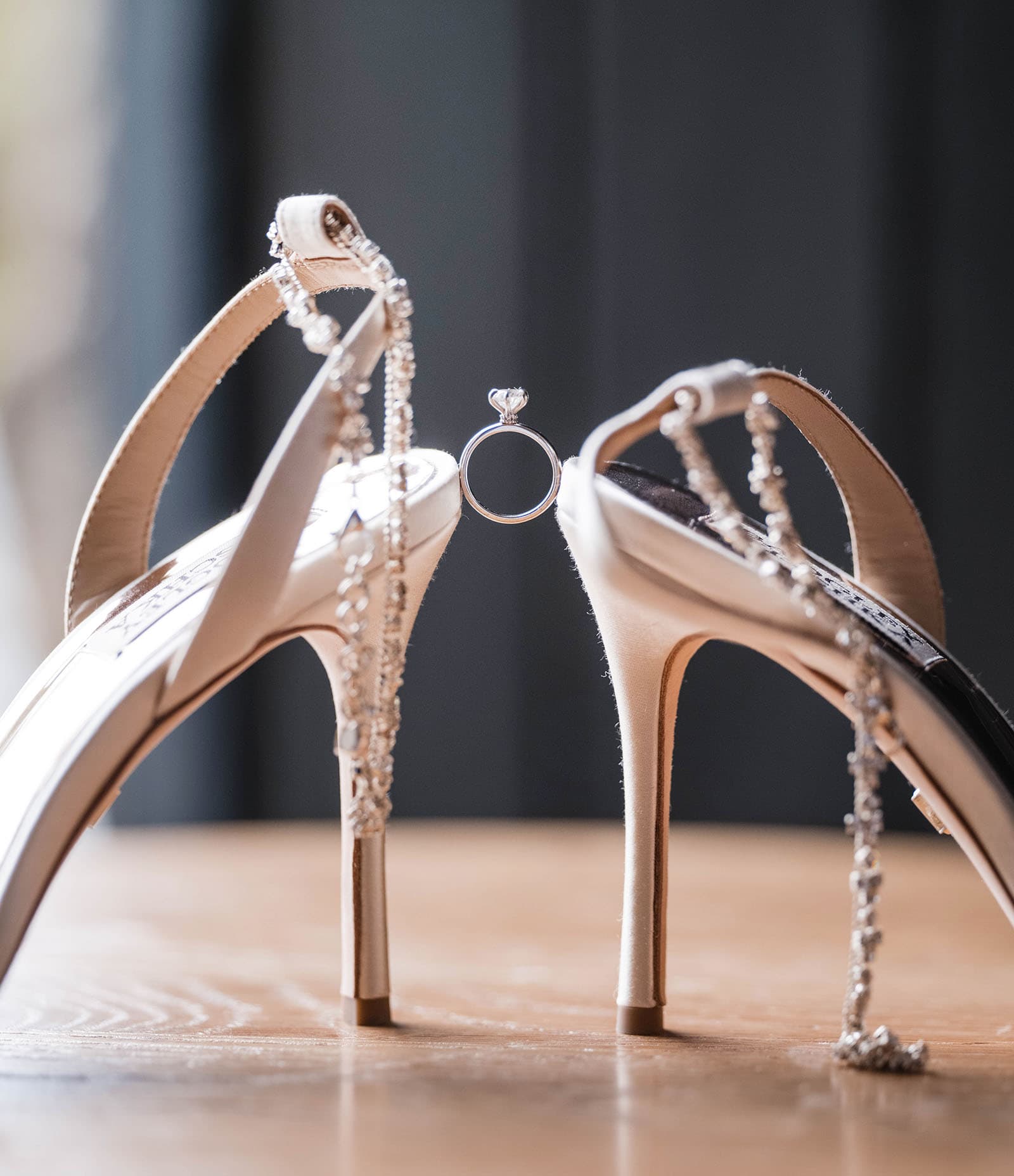 the manor basket range wedding - cassie & danny 17 Engagemet ring in between shoes