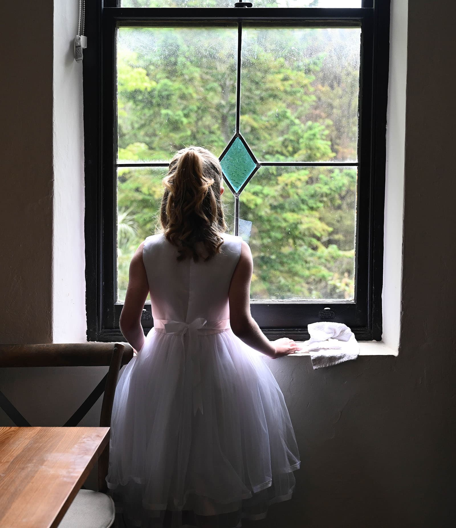 the manor basket range wedding - cassie & danny 21 Flower girl looking out window