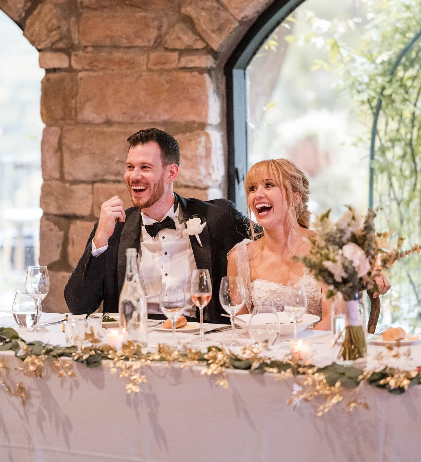 the manor basket range wedding - cassie & danny 80 Laughing bride and groom at speech